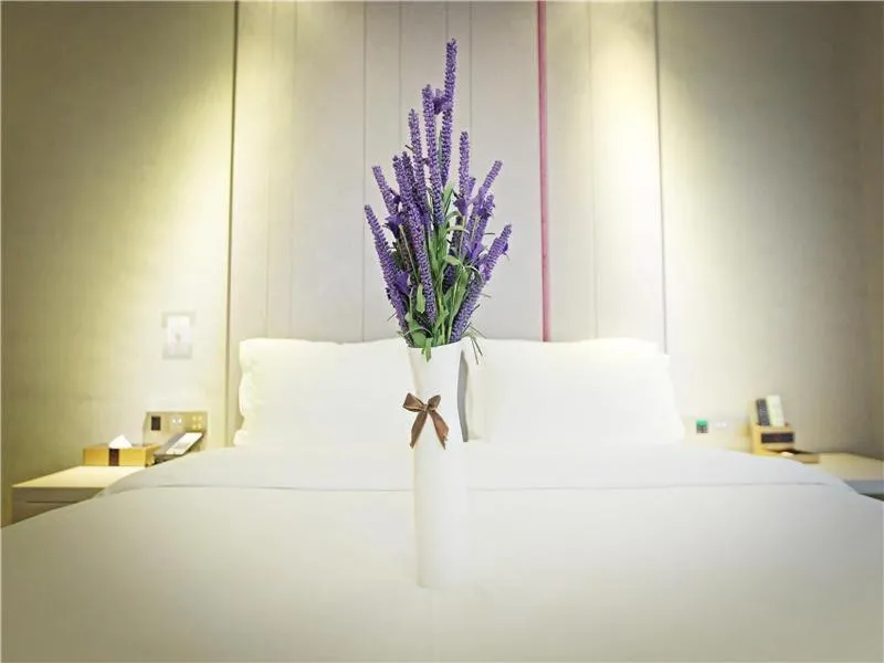 Bed in Lavande Hotel Guiyang Flower Orchard Fortune Plaza