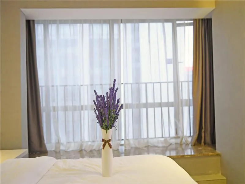Bed in Lavande Hotel Guiyang Flower Orchard Fortune Plaza