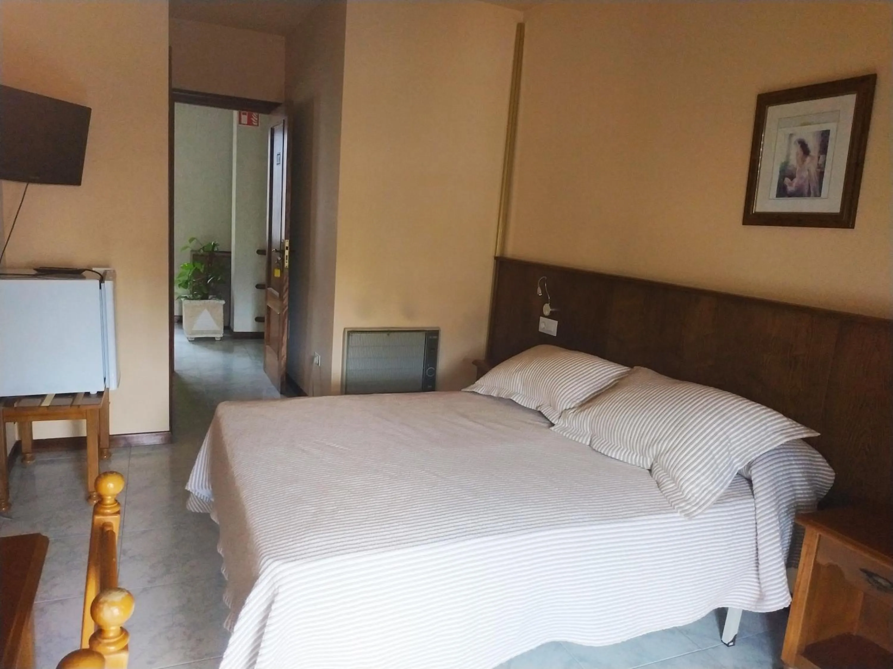 Bed in Hotel Cristaleiro