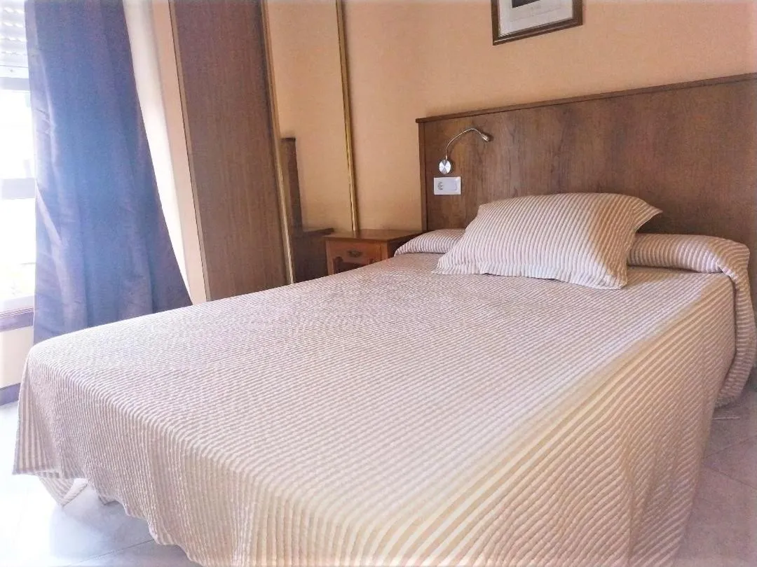 Bed in Hotel Cristaleiro
