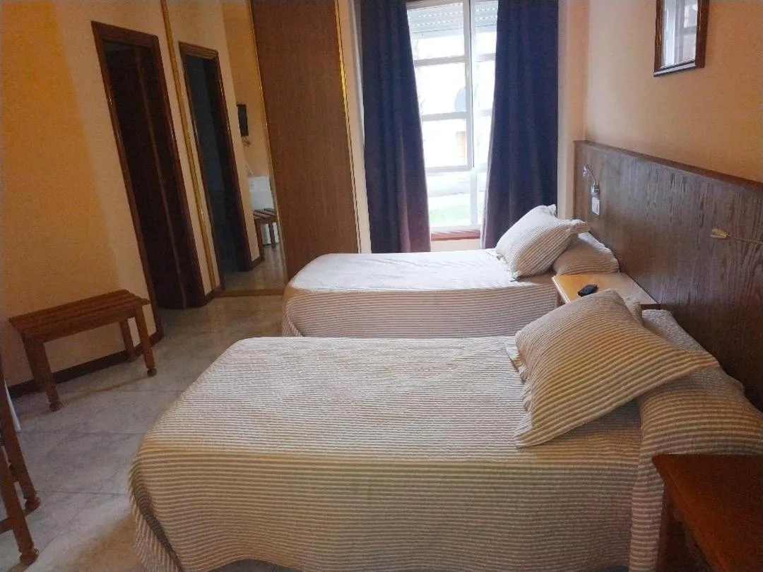 Bed in Hotel Cristaleiro