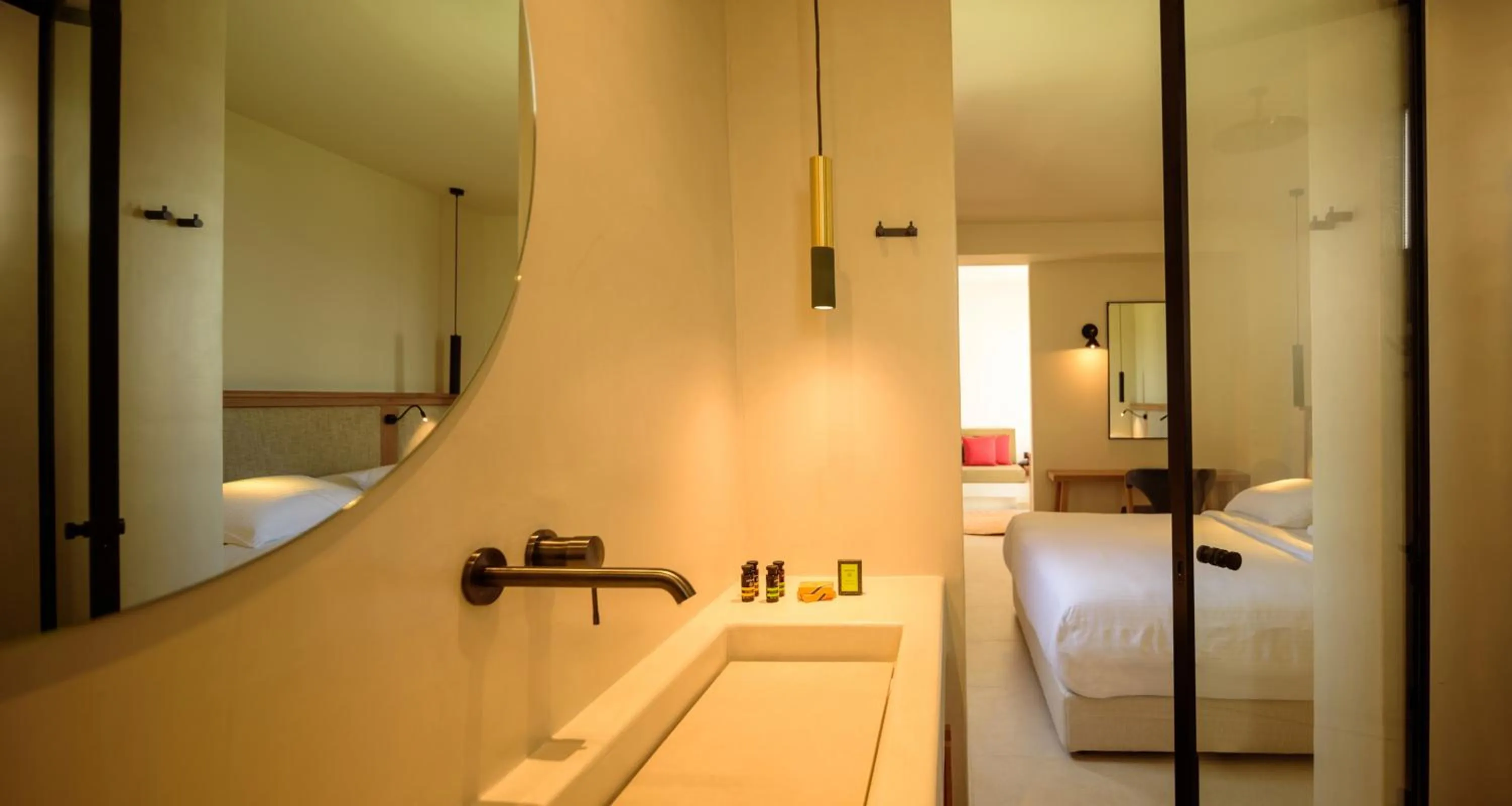 Bed in Potnia Theron Suites