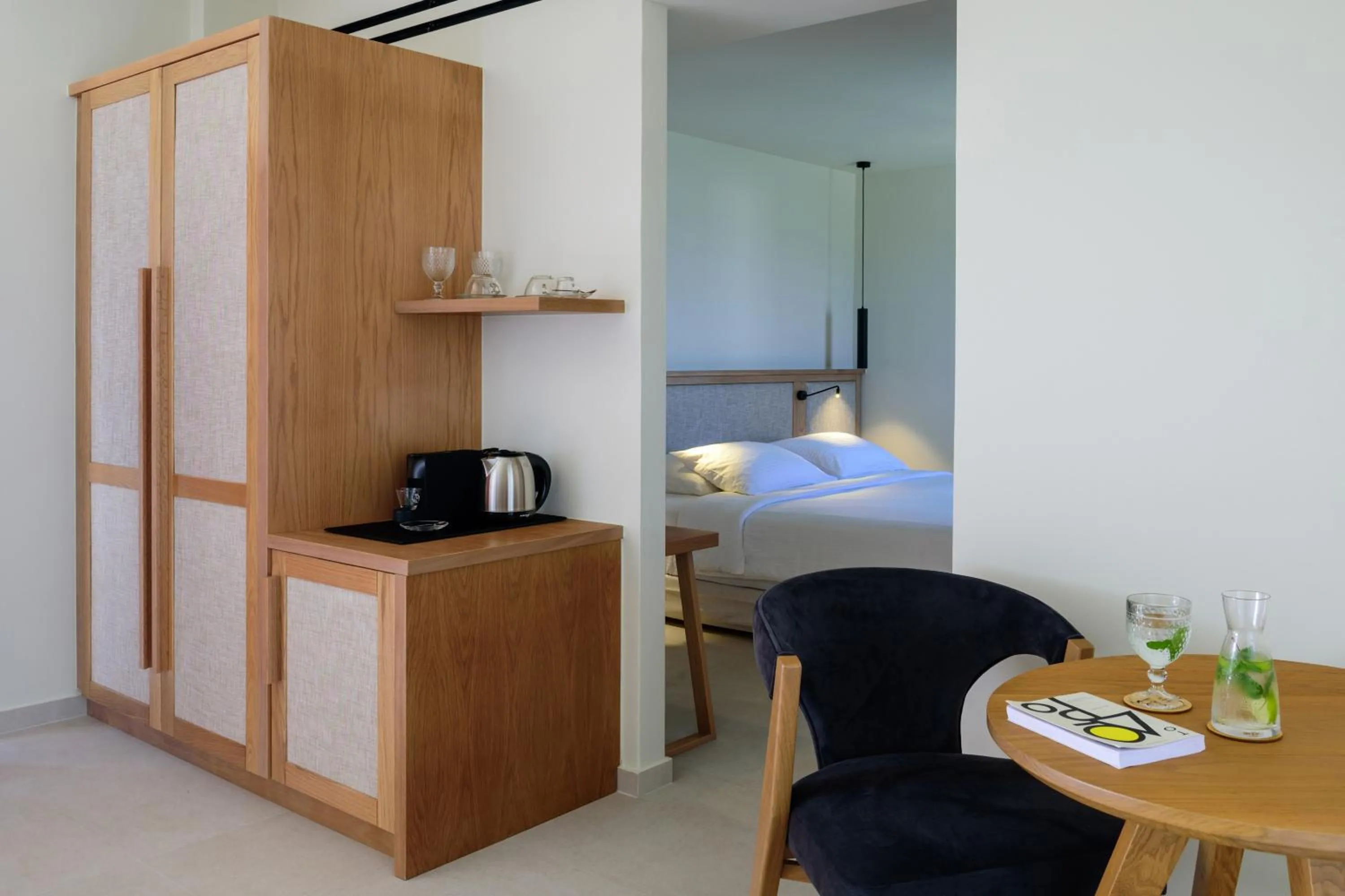 Bed in Potnia Theron Suites