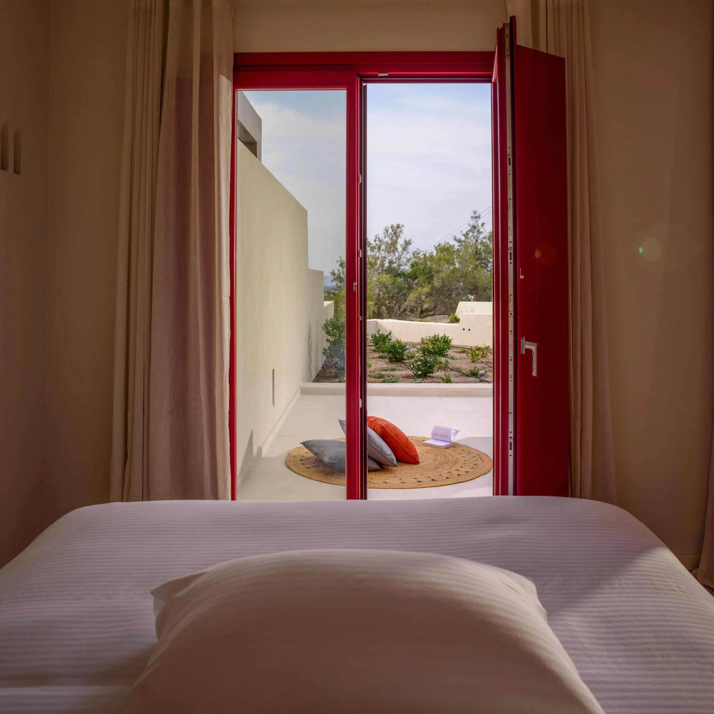 Bed in Potnia Theron Suites