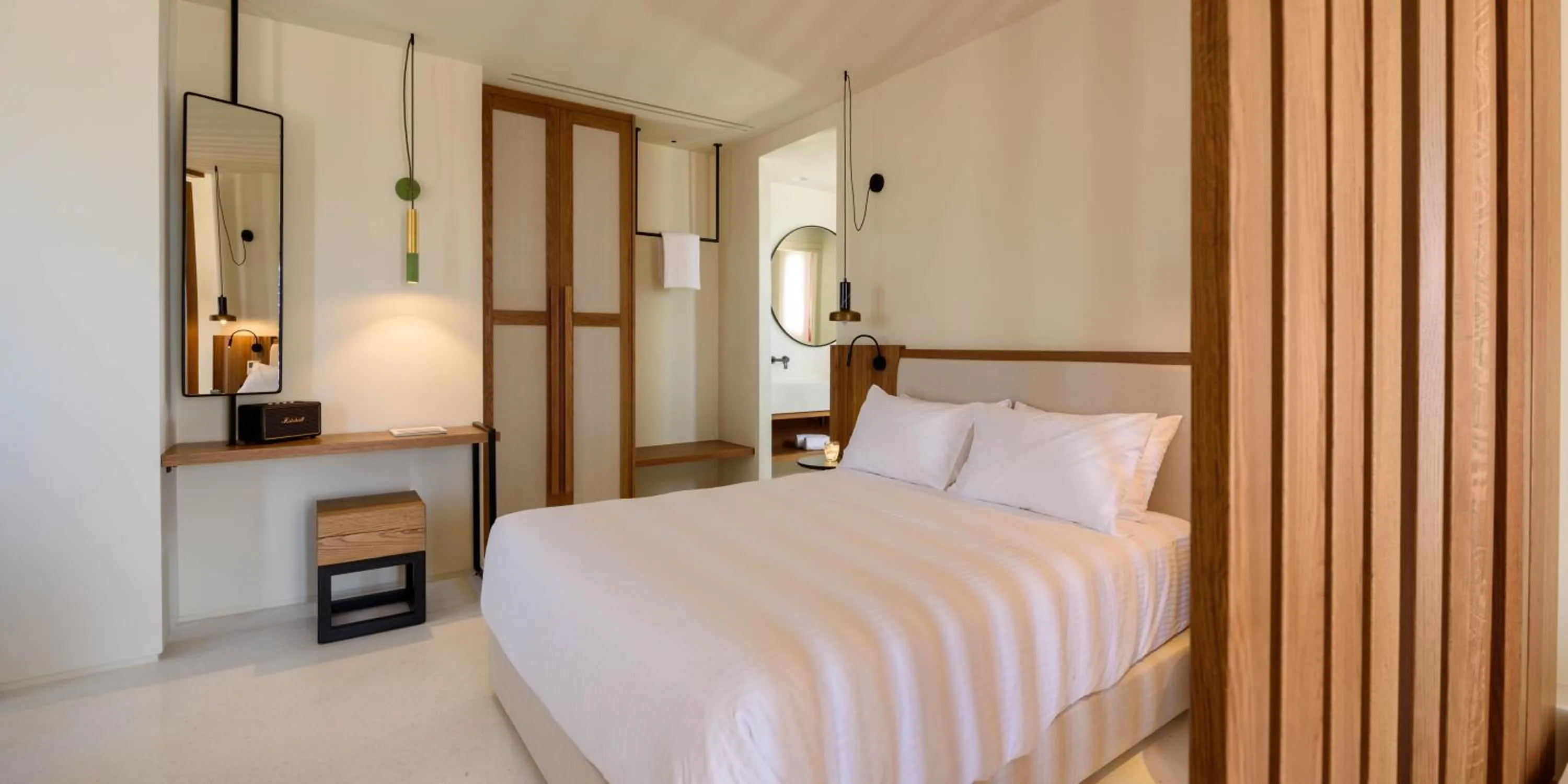 Bed in Potnia Theron Suites