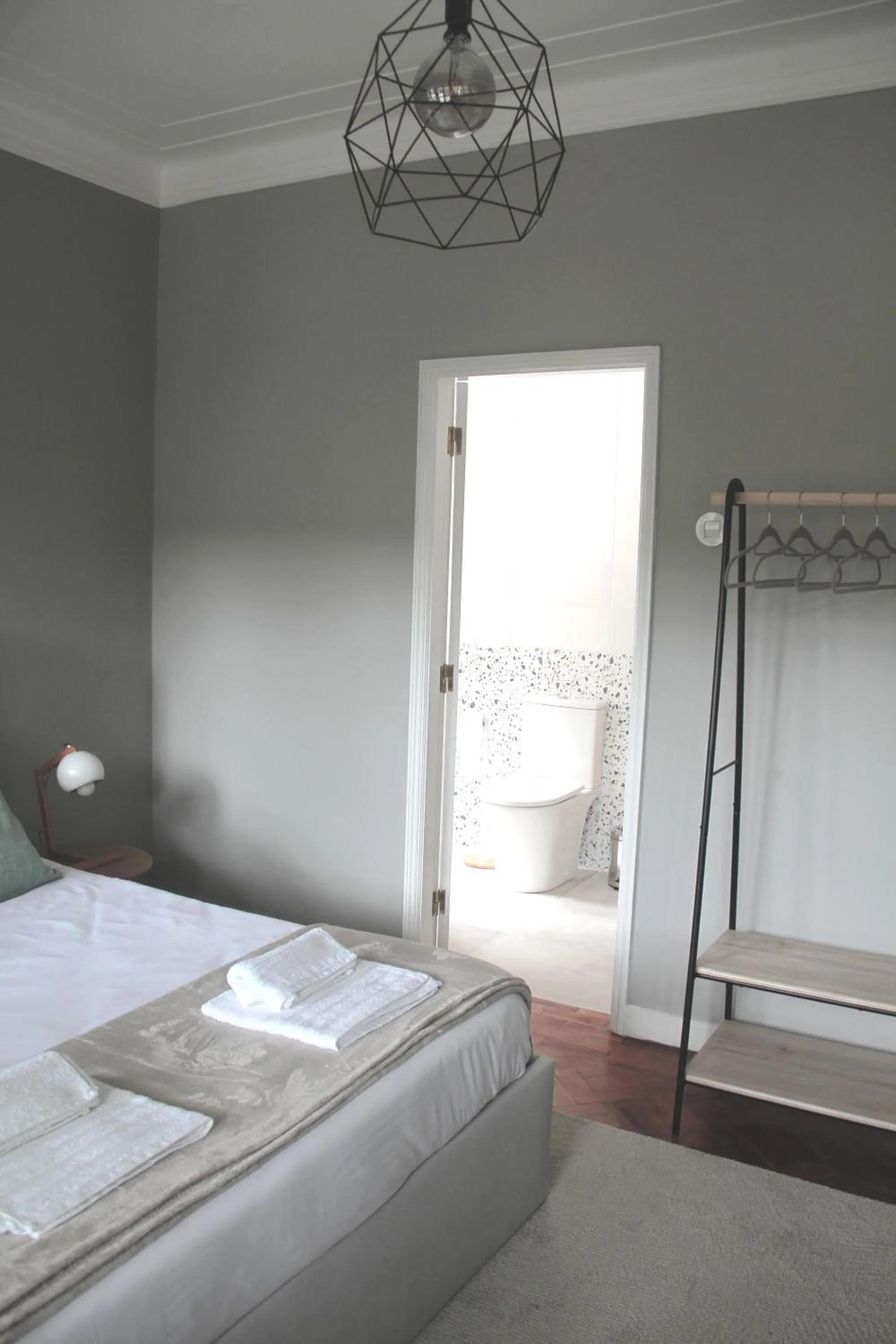 Bed in Genius Loci Guesthouse