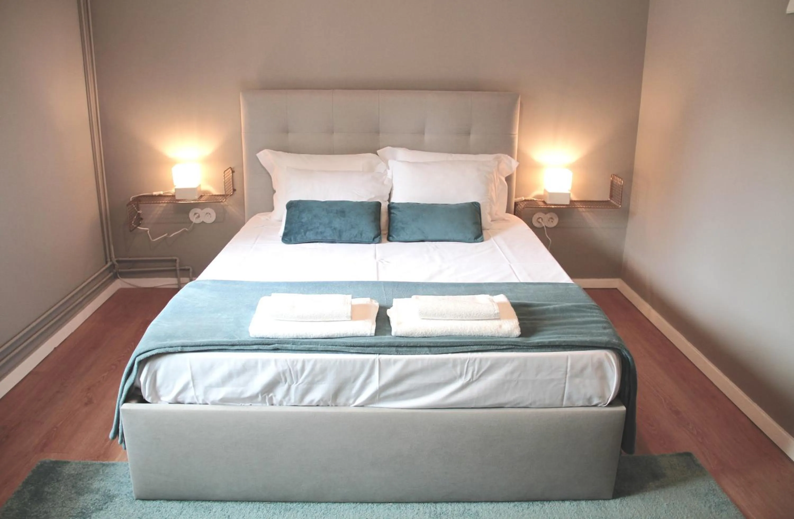 Bed in Genius Loci Guesthouse