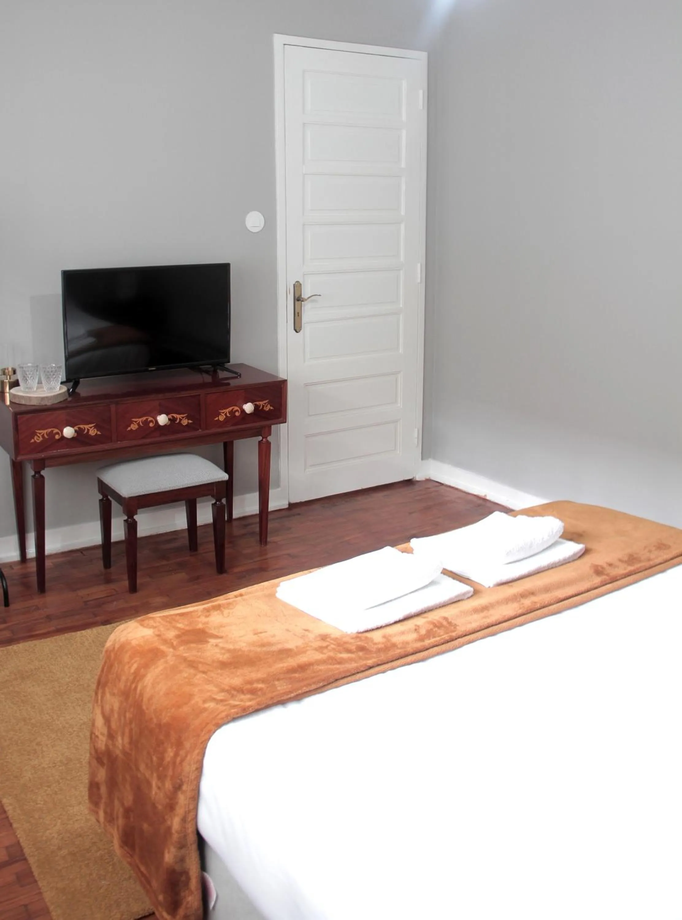 Bed in Genius Loci Guesthouse