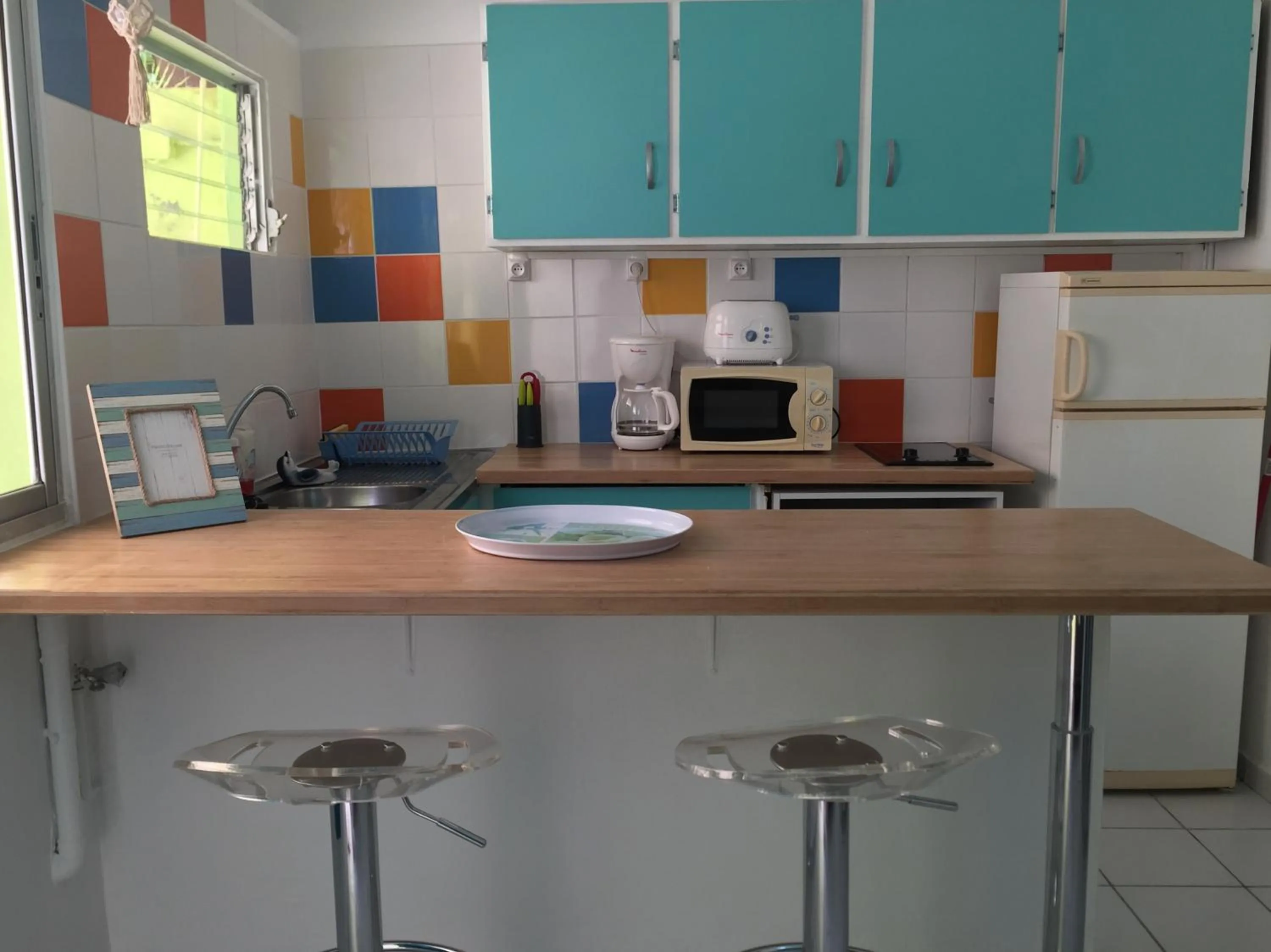 Kitchen or kitchenette in Résidence Paradis Tropical