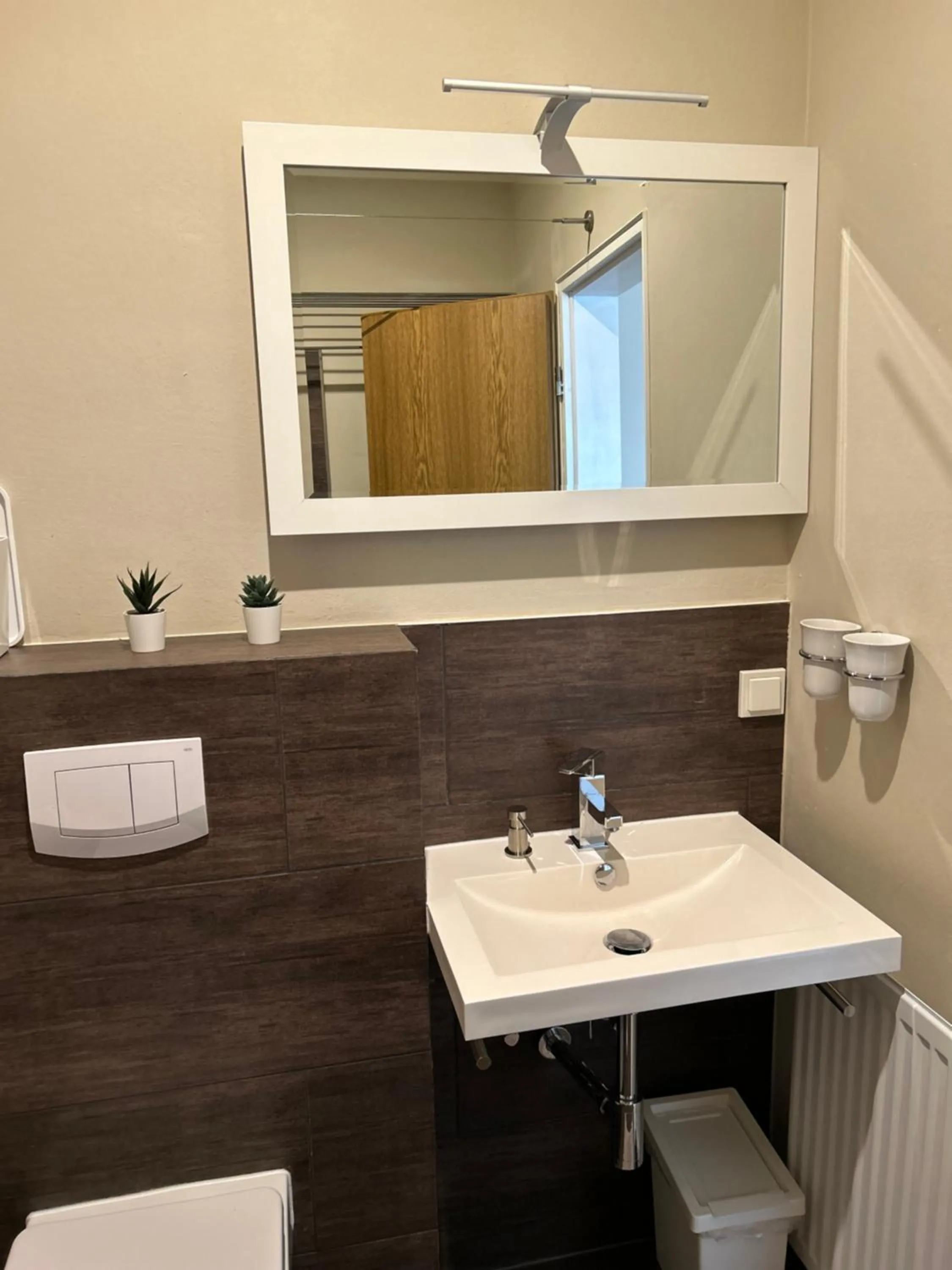 Toilet in WohnRaum Gäste- & Boardinghaus