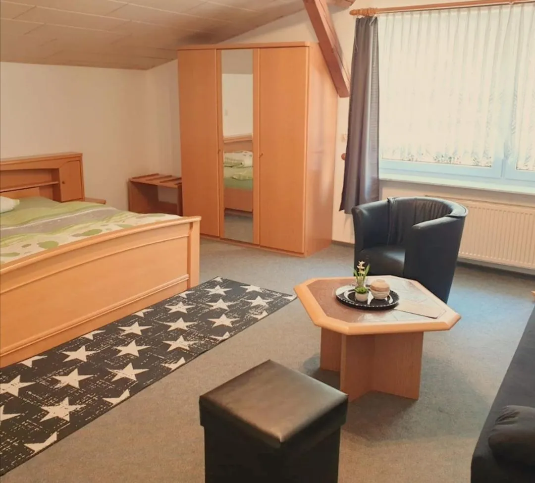 Photo of the whole room, Bed in Landhotel Heidkrug