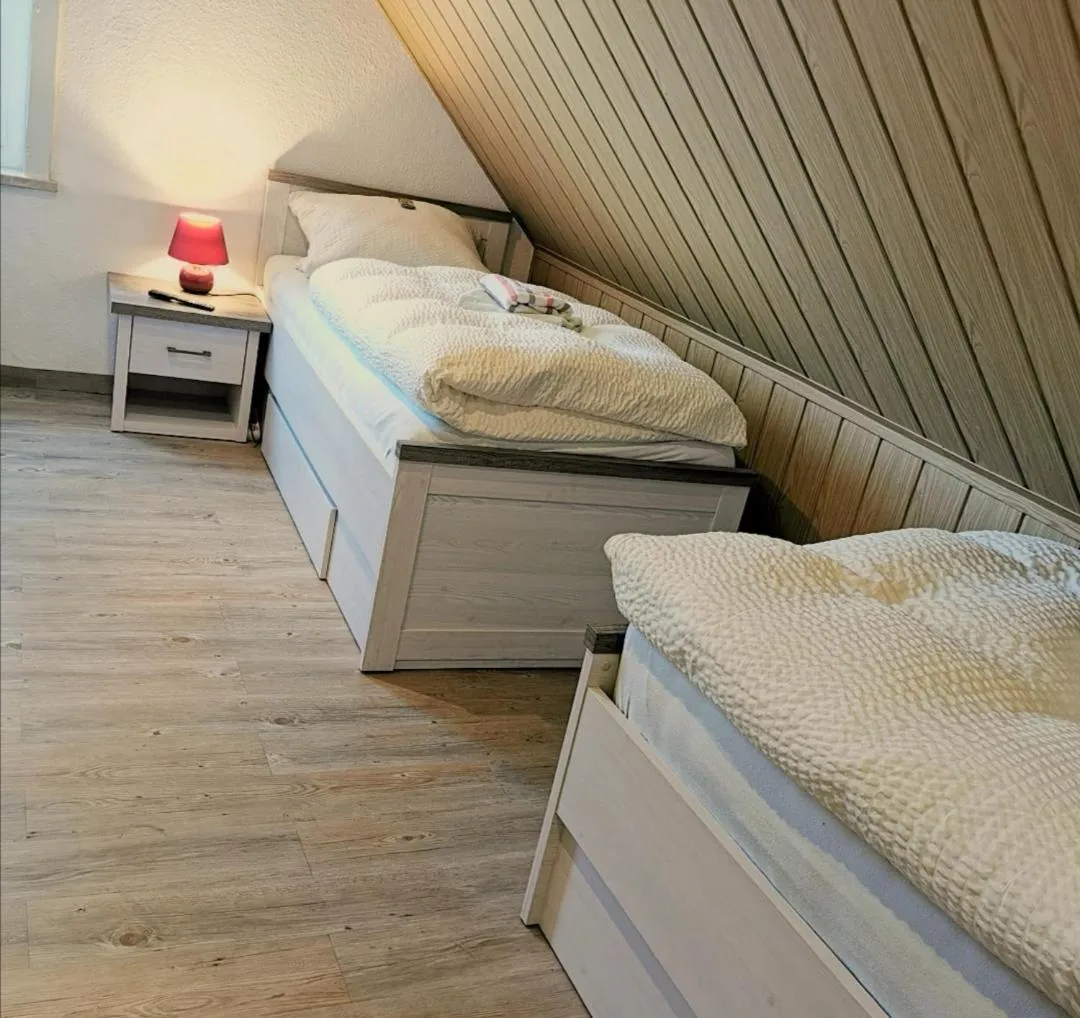 Photo of the whole room, Bed in Landhotel Heidkrug