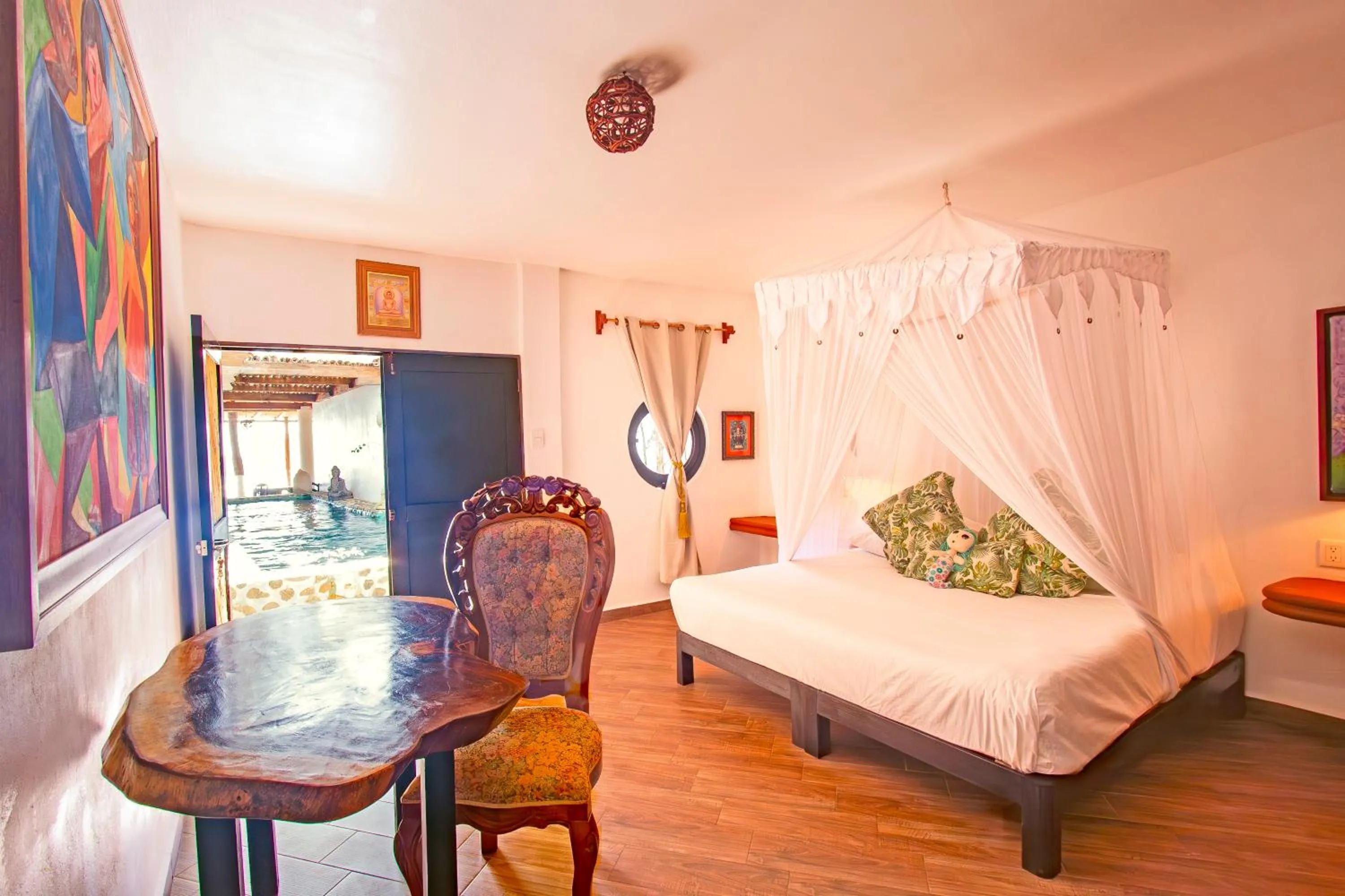 Photo of the whole room, Bed in Posada Buda-Tortuga