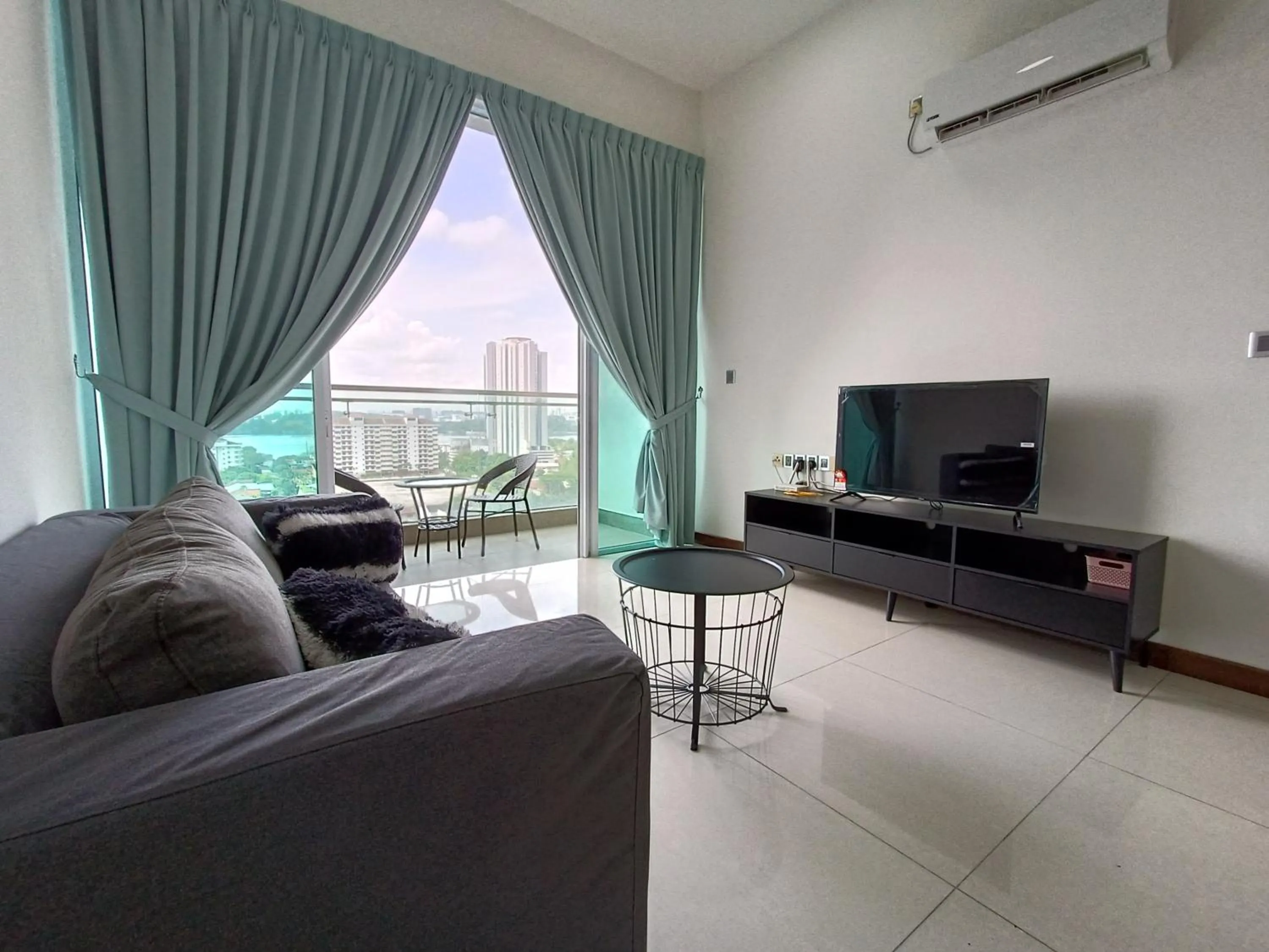 Living room in Paragon Suite Homestay by Antlerzone