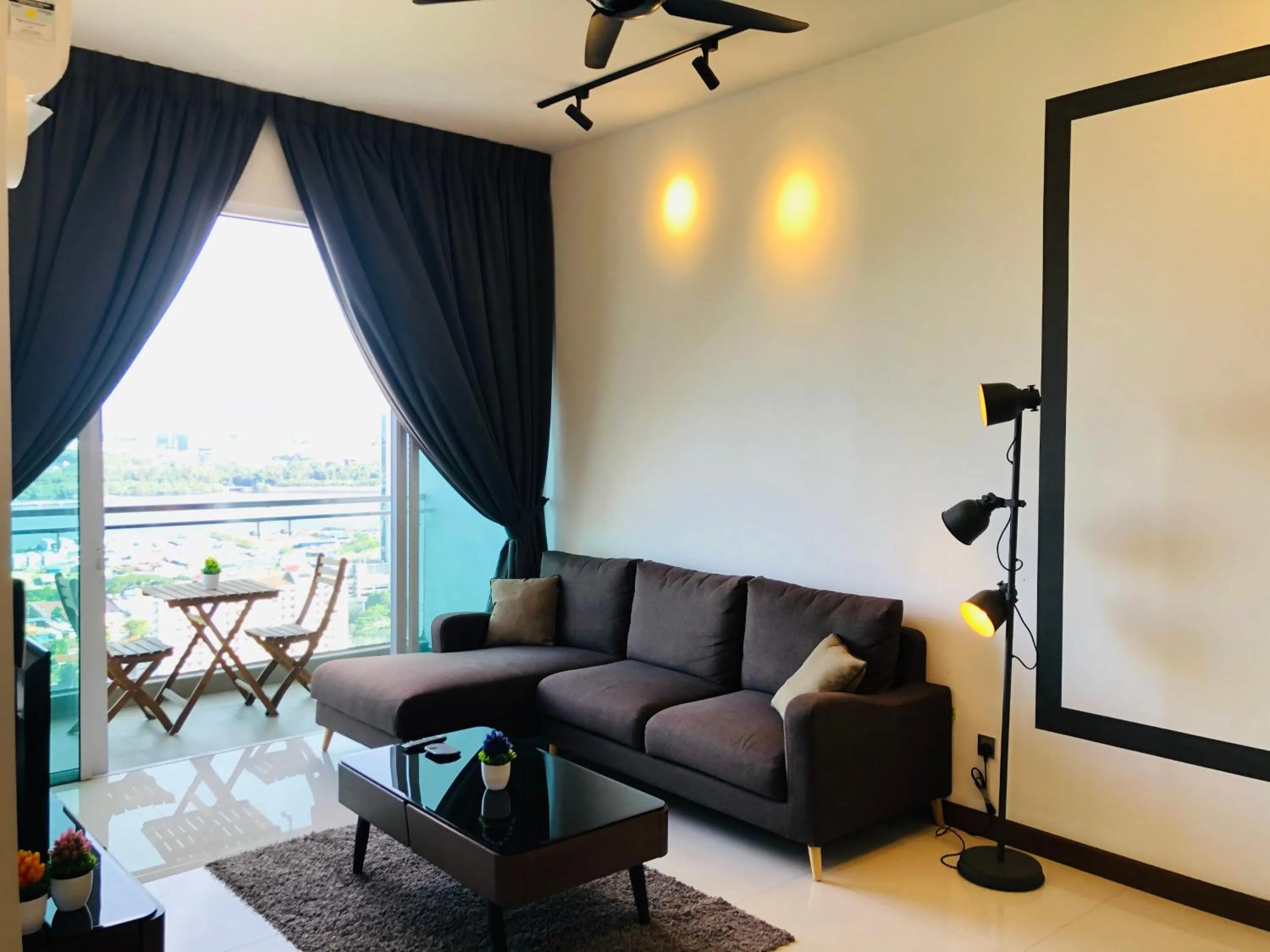 Living room in Paragon Suite Homestay by Antlerzone