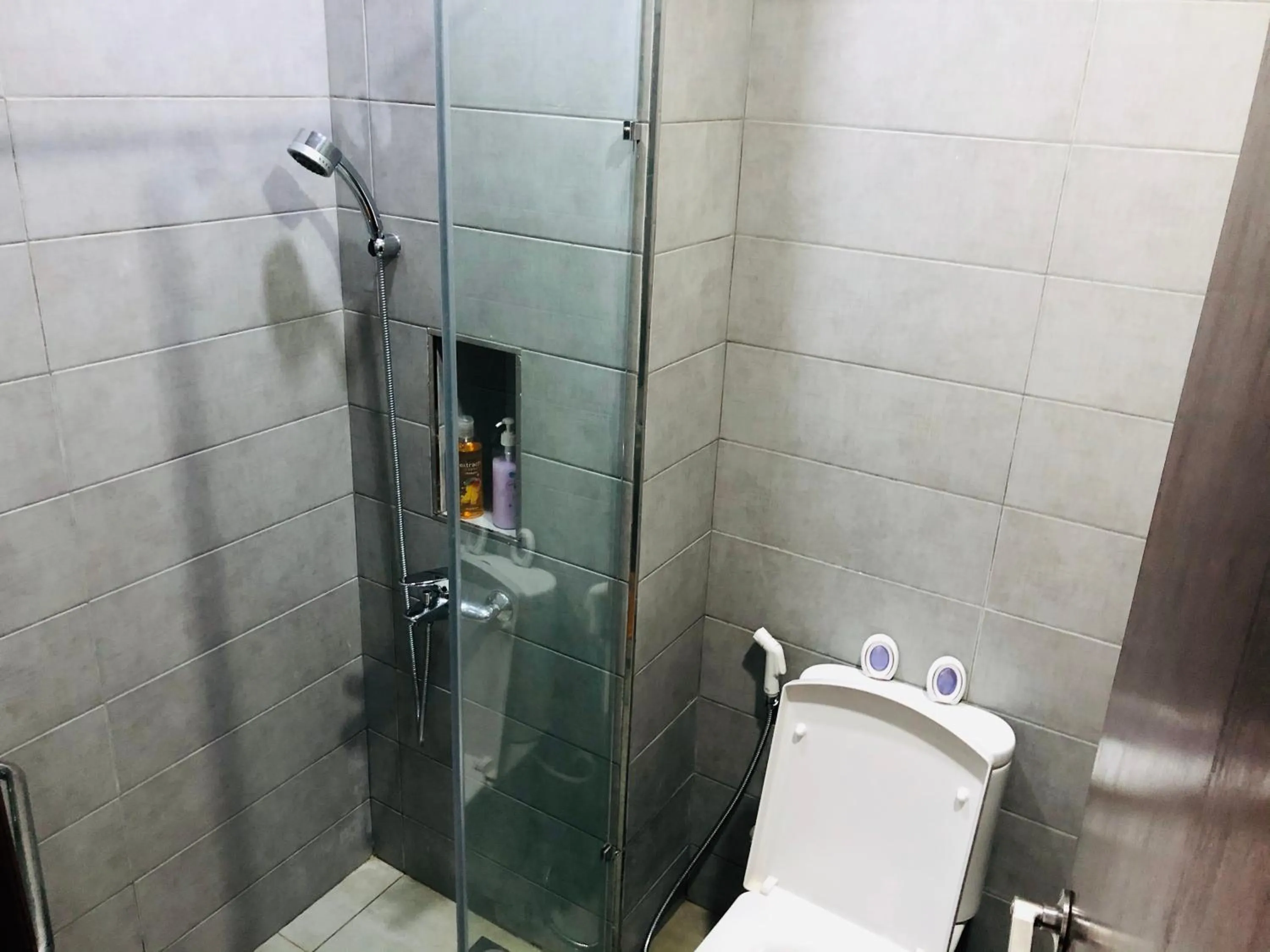 Bathroom in Paragon Suite Homestay by Antlerzone