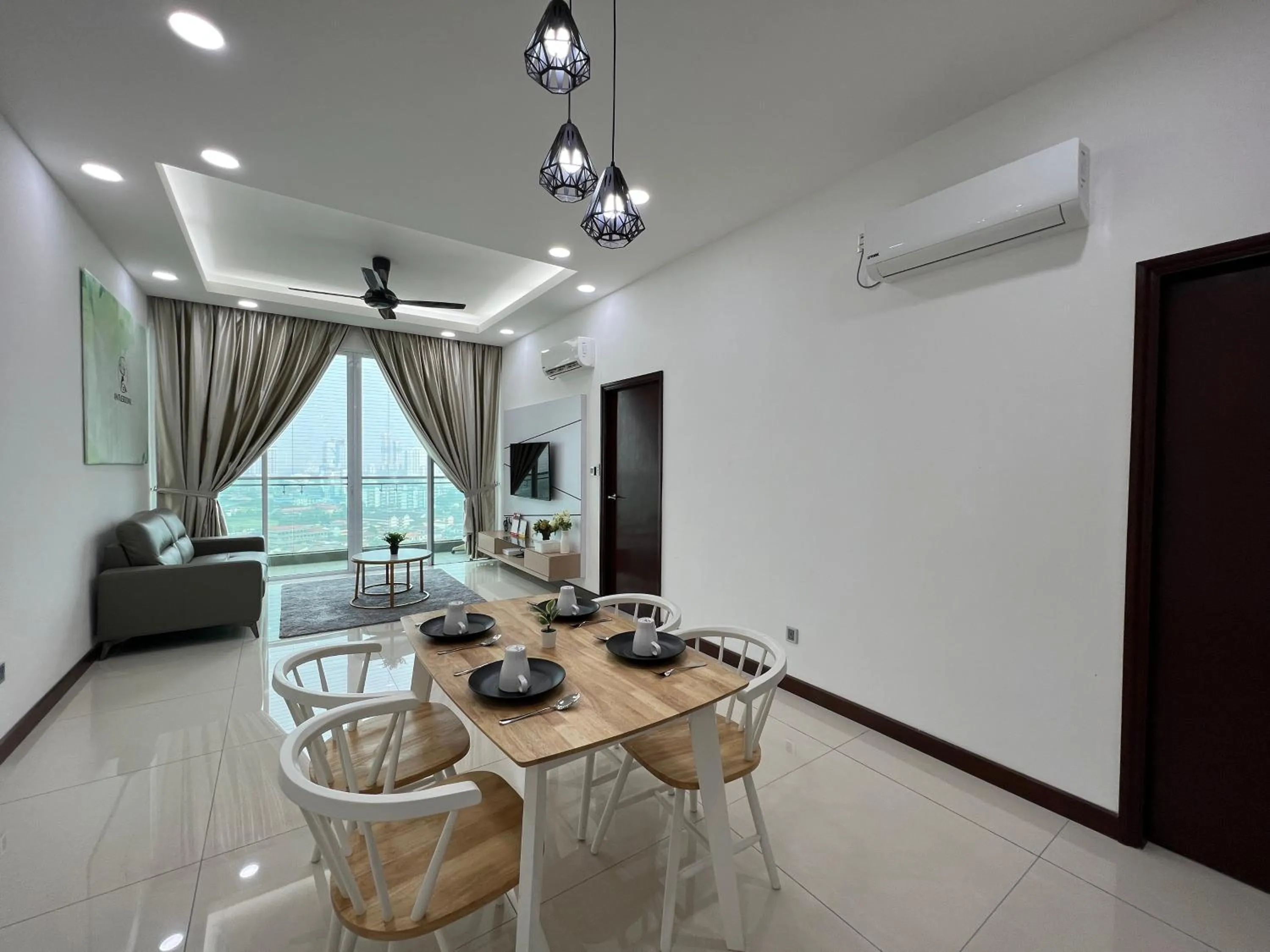 Seating area in Paragon Suite Homestay by Antlerzone