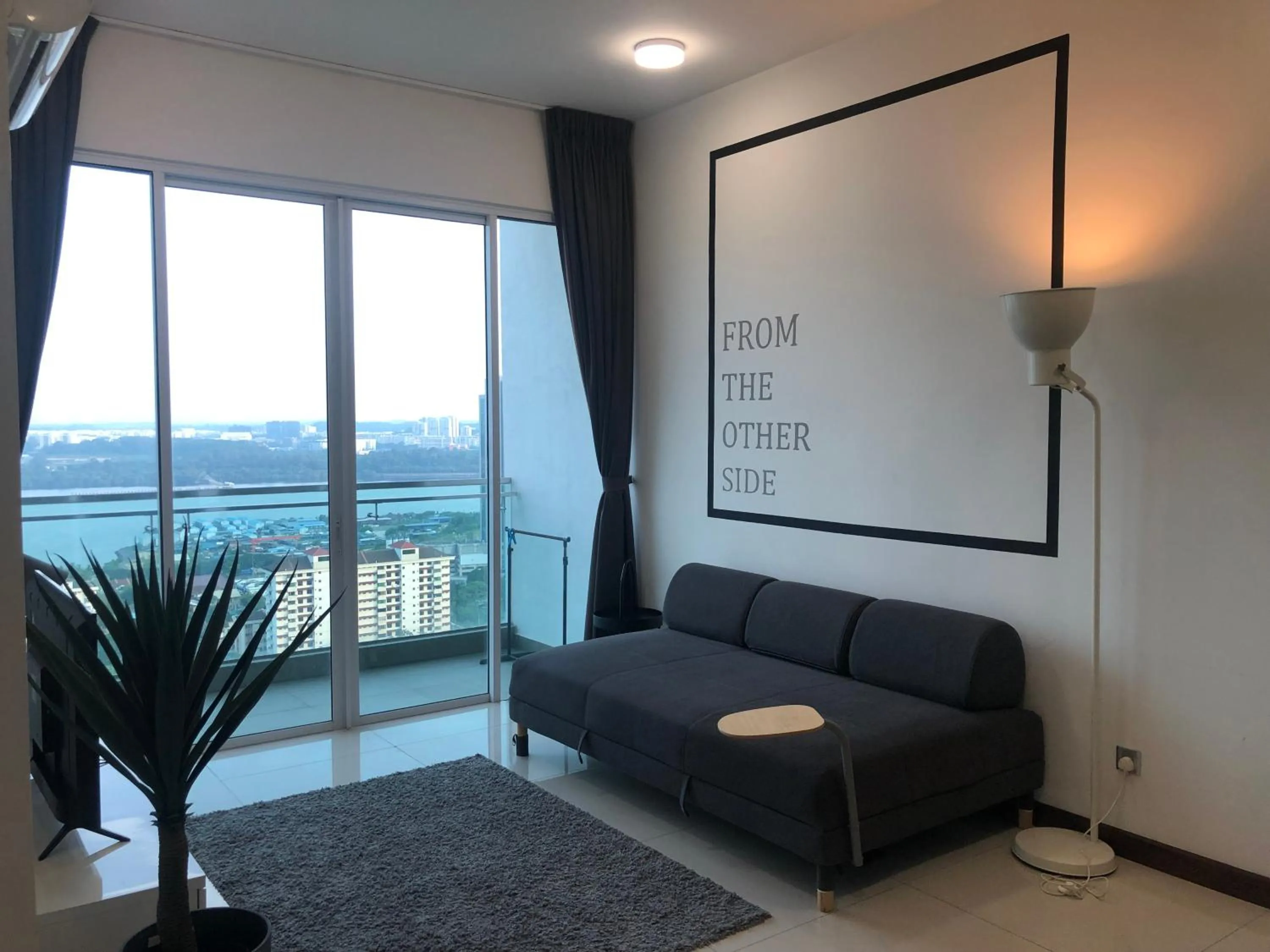 Living room in Paragon Suite Homestay by Antlerzone