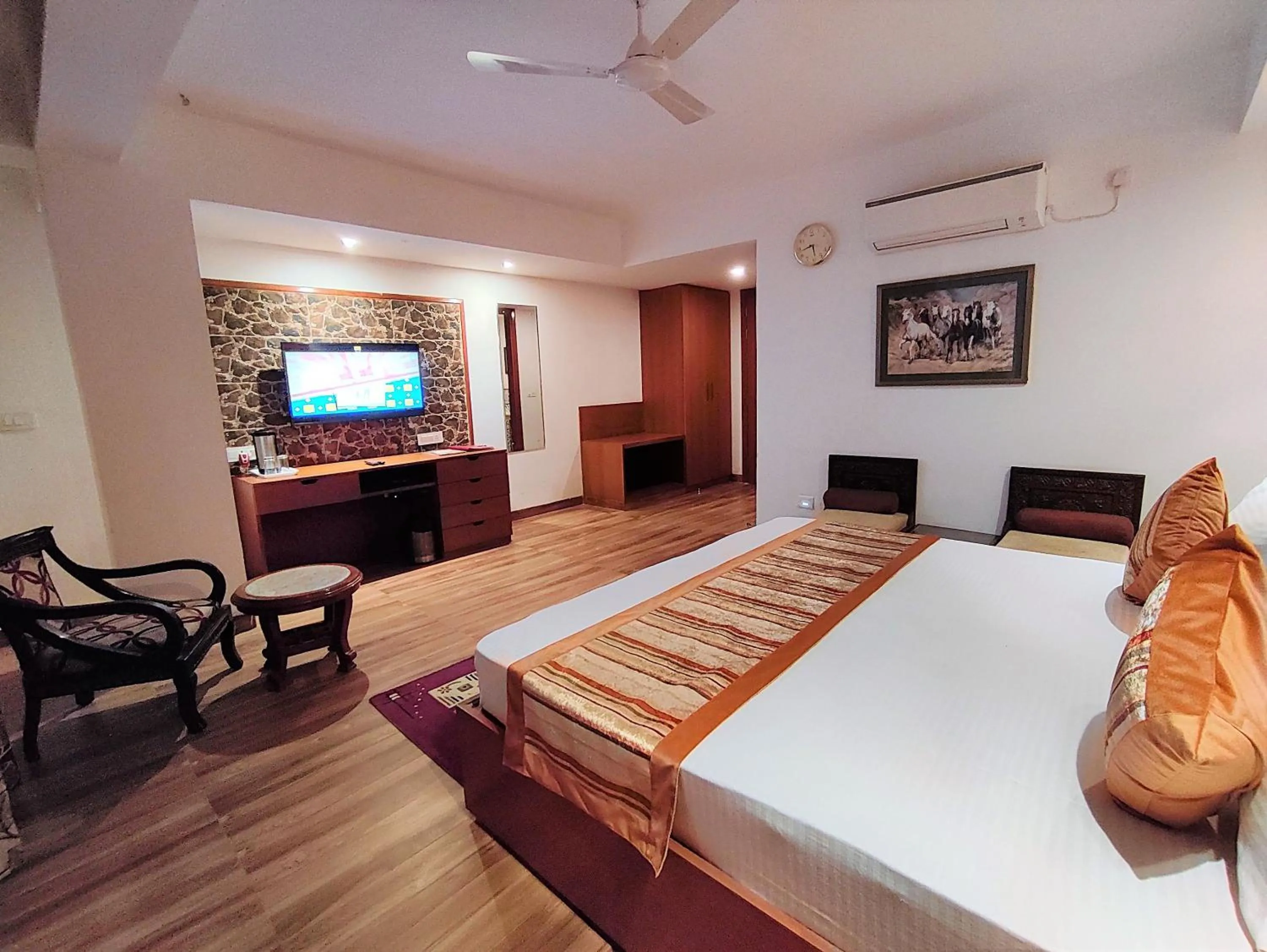 Photo of the whole room, Bed in The Angel Hotel & Suites near Medanta