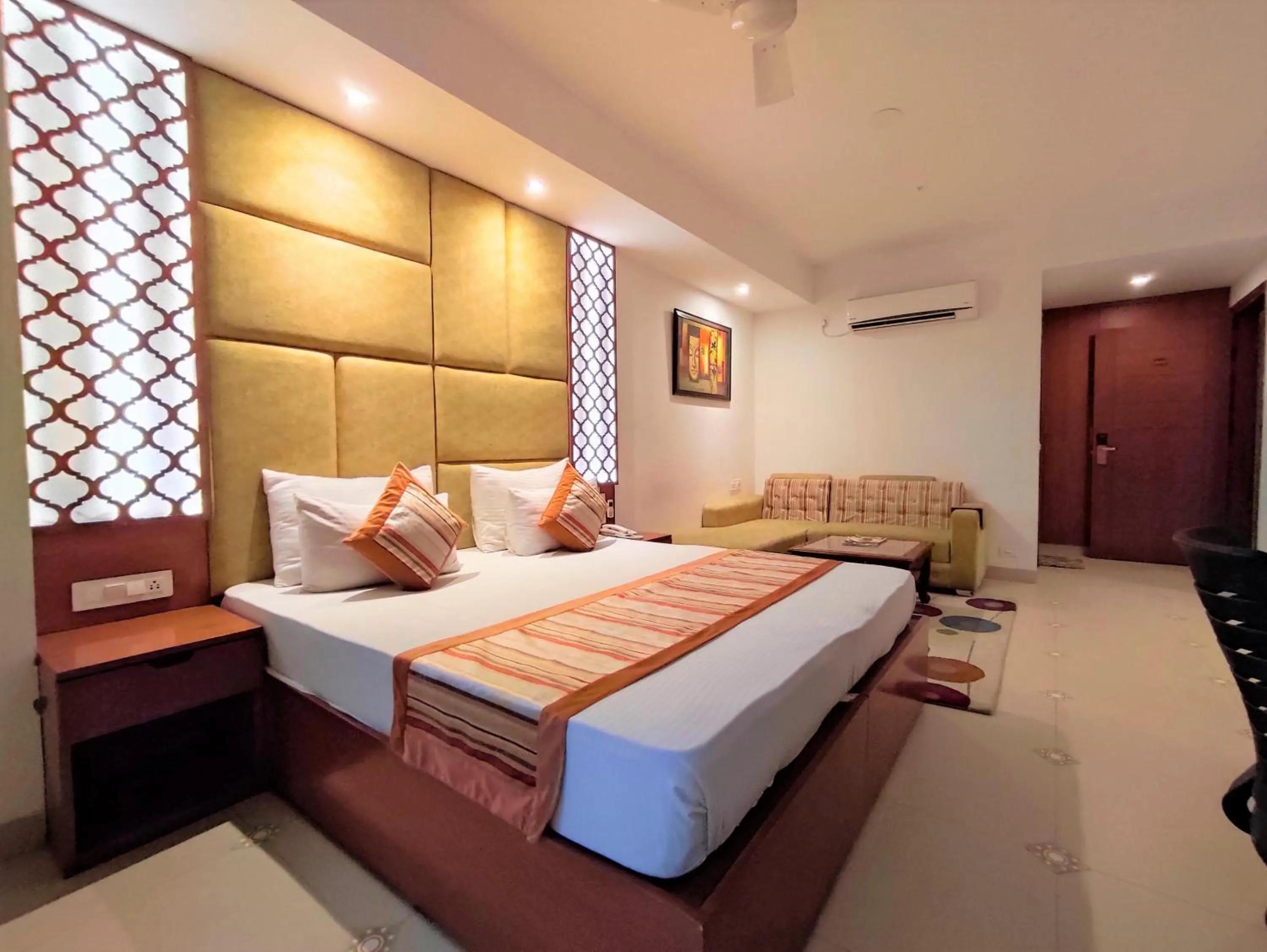 Bed in The Angel Hotel & Suites near Medanta