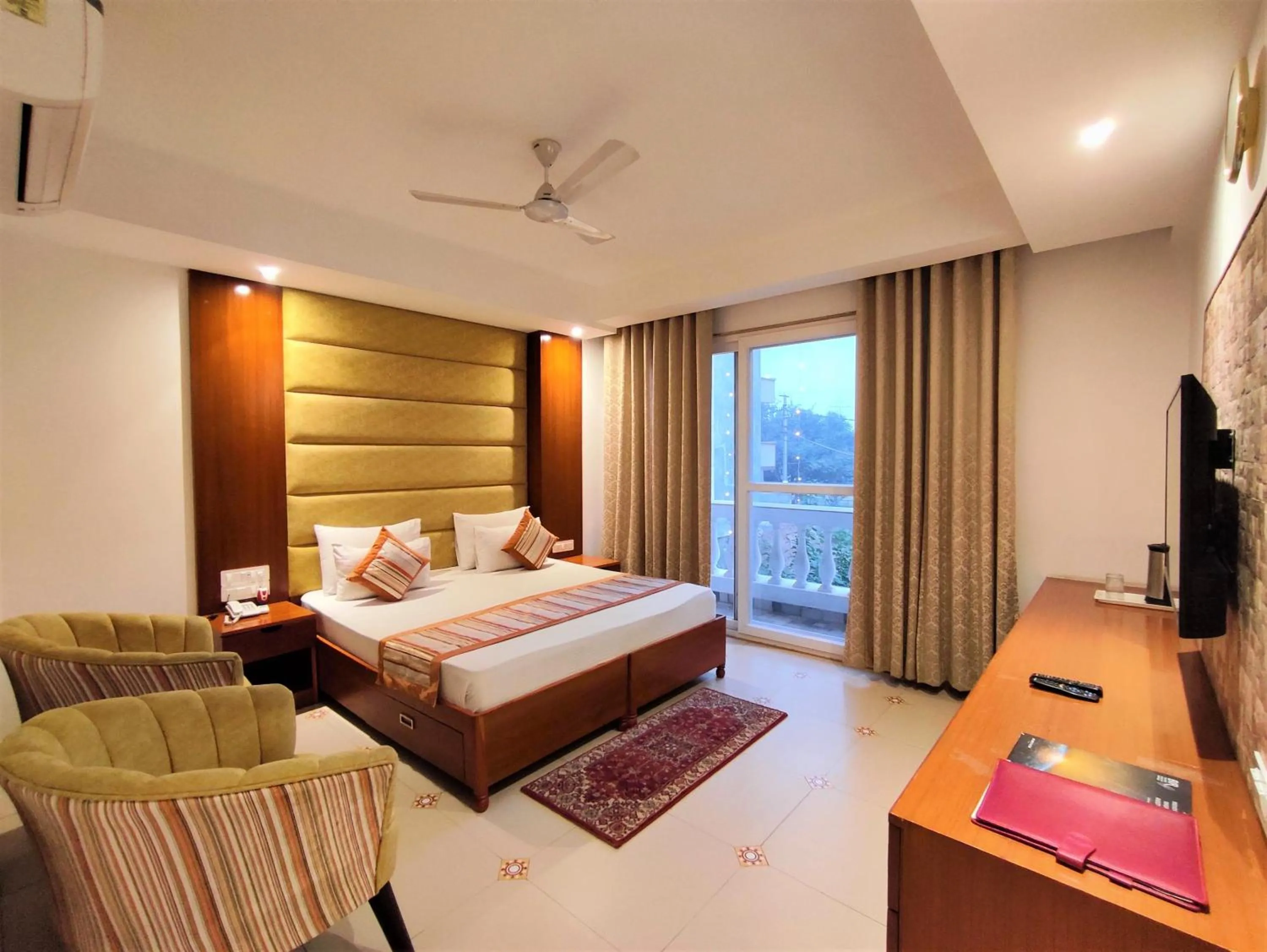 Photo of the whole room, Bed in The Angel Hotel & Suites near Medanta
