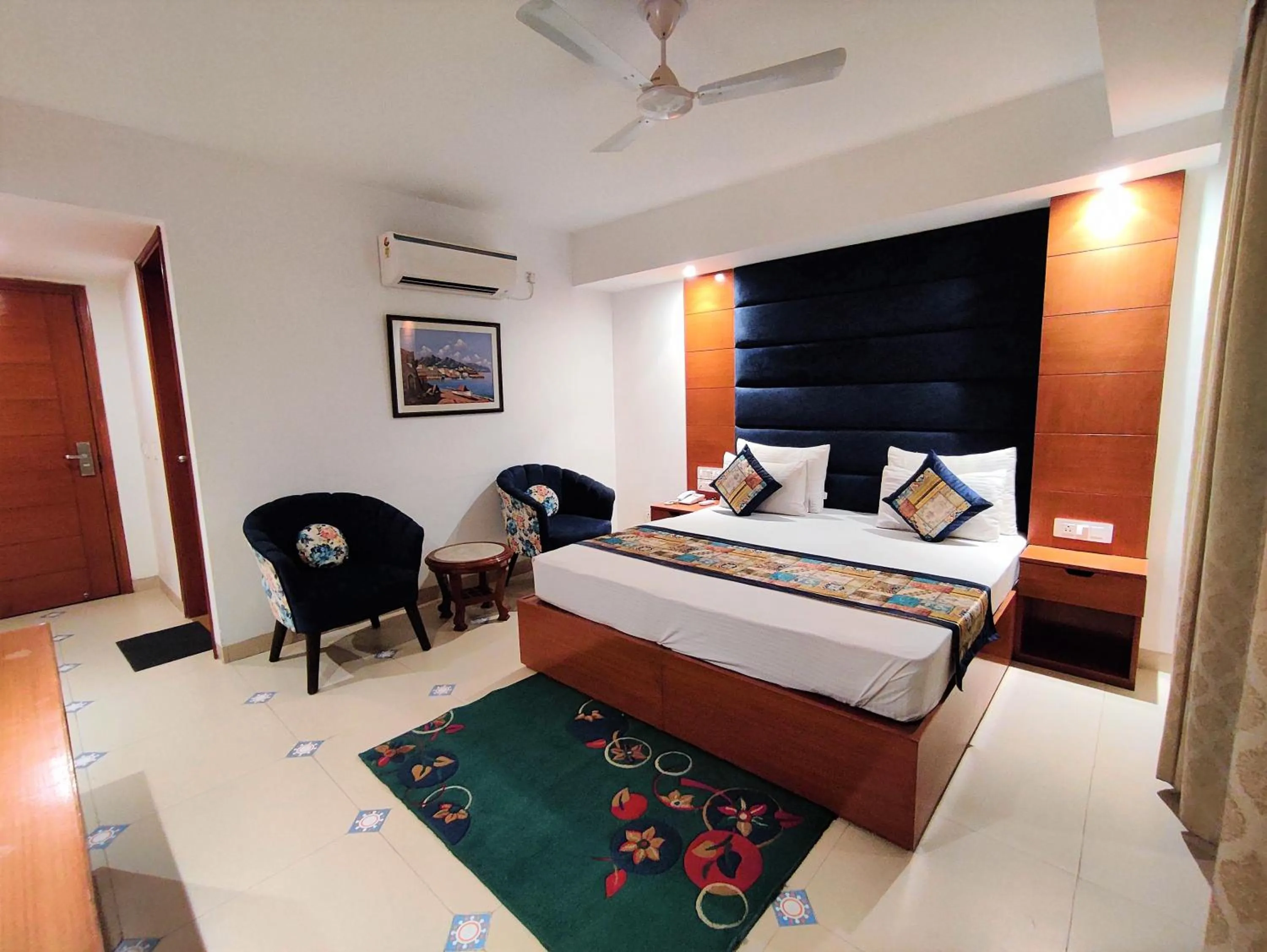 Photo of the whole room, Bed in The Angel Hotel & Suites near Medanta