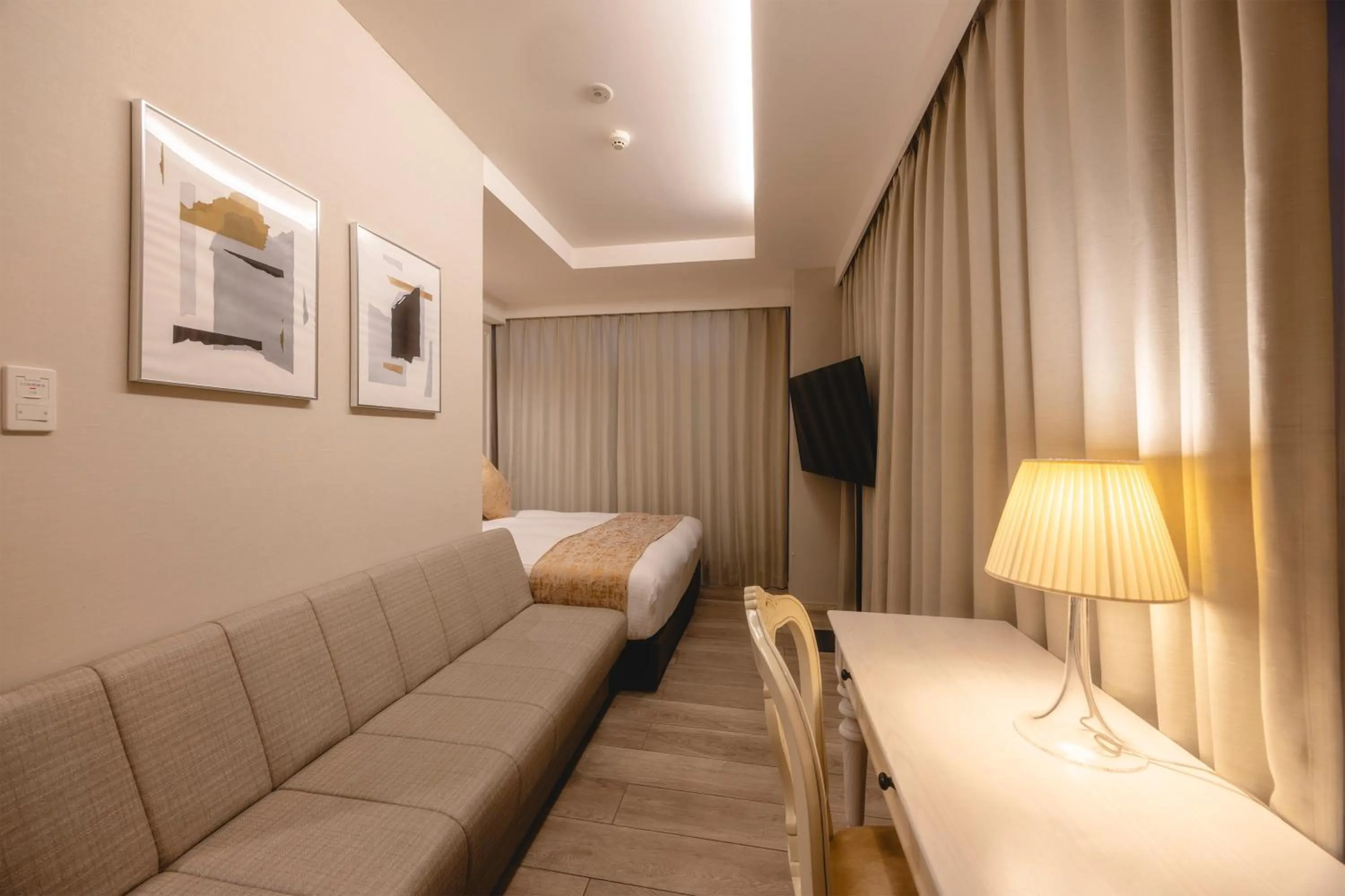 Photo of the whole room, Bed in Centurion Hotel Residential Akasaka Station