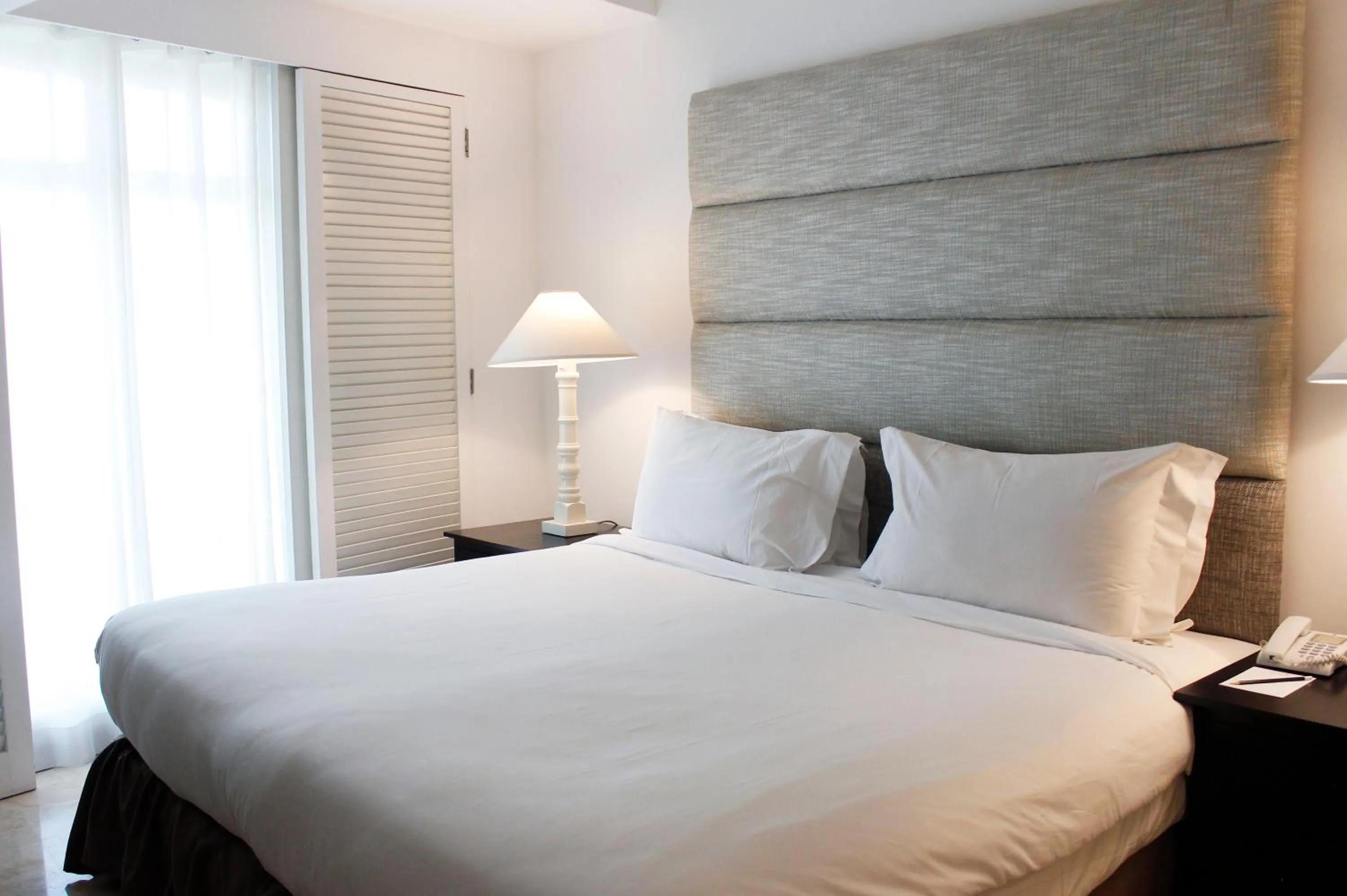 Bed in Vivere Hotel and Resorts