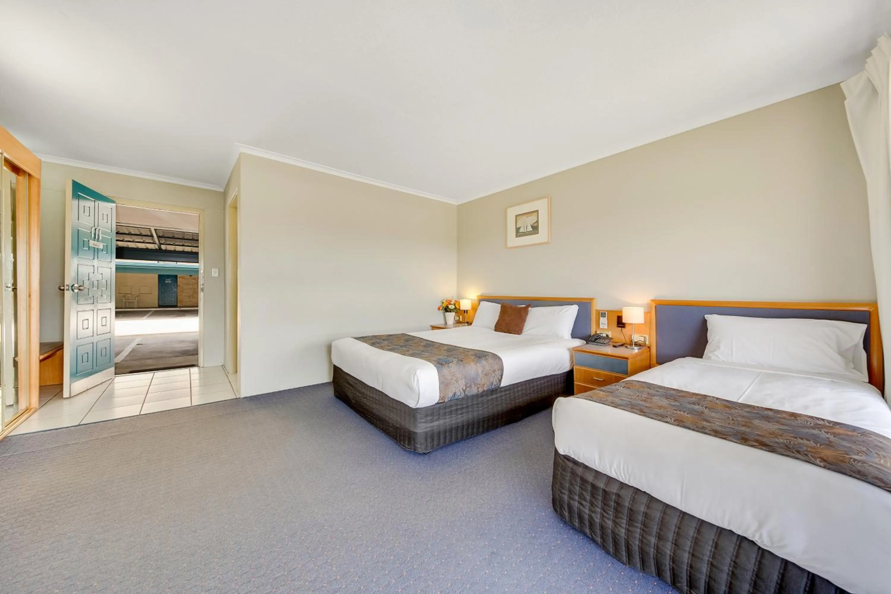 Bed in Gladstone Palms Motor Inn