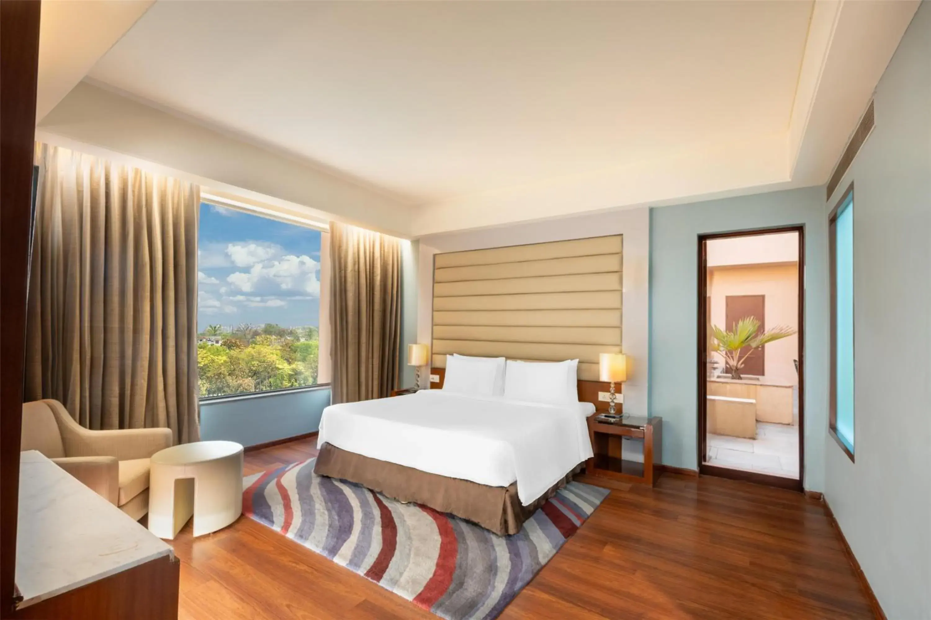 Photo of the whole room, Bed in Radisson Blu Hotel Rudrapur Photo of the whole room, Bed in Radisson Blu Hotel Rudrapur