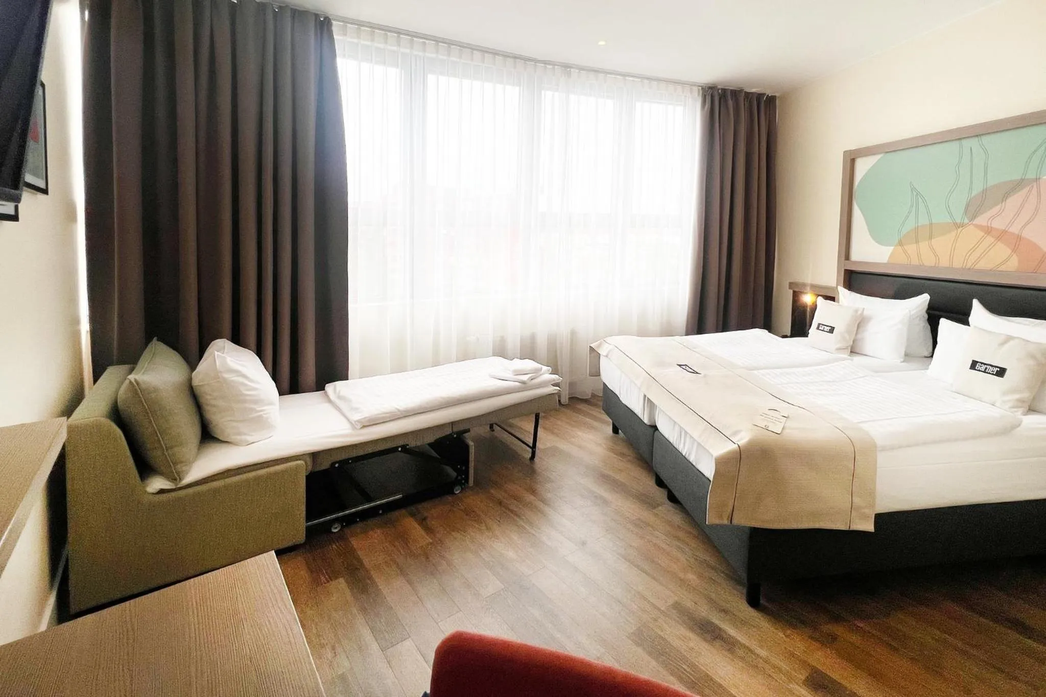 Photo of the whole room, Bed in Garner Hotel Berlin - Charlottenburg, an IHG Hotel