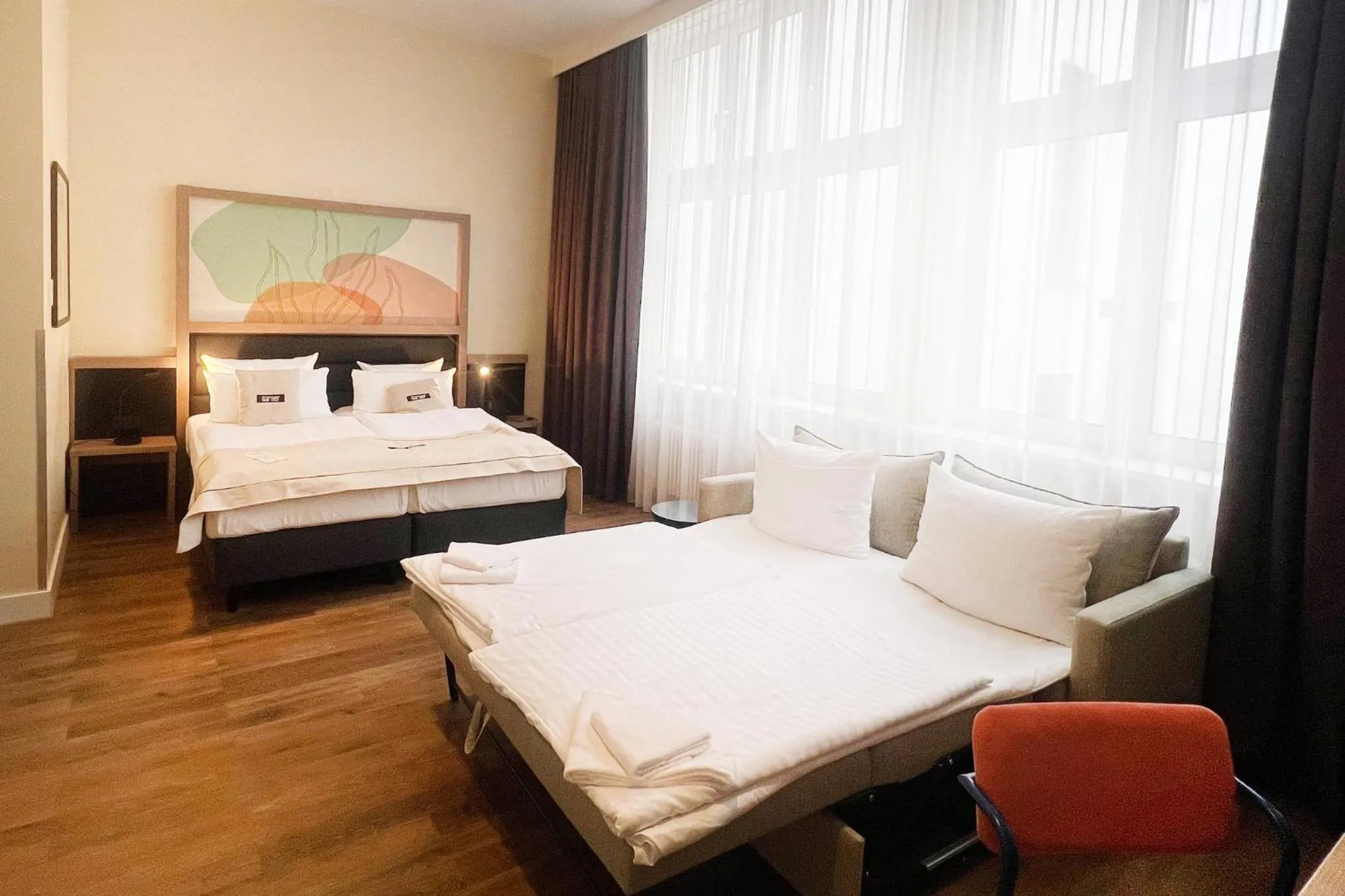 Photo of the whole room, Bed in Garner Hotel Berlin - Charlottenburg, an IHG Hotel