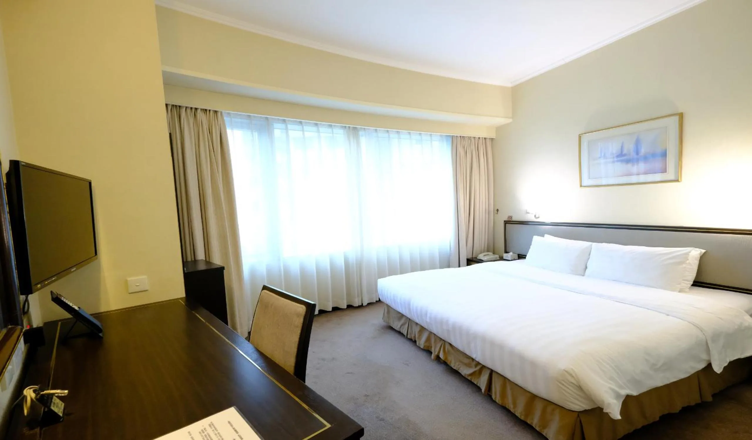 Bed in South Pacific Hotel