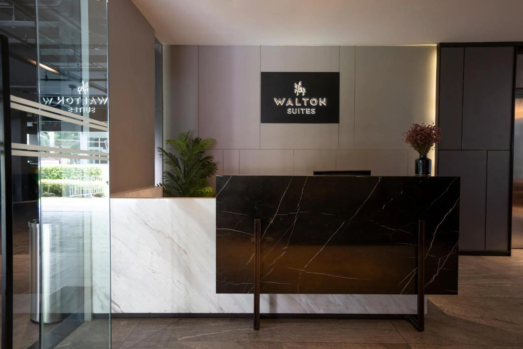 Lobby or reception in Walton Suites Sukhumvit