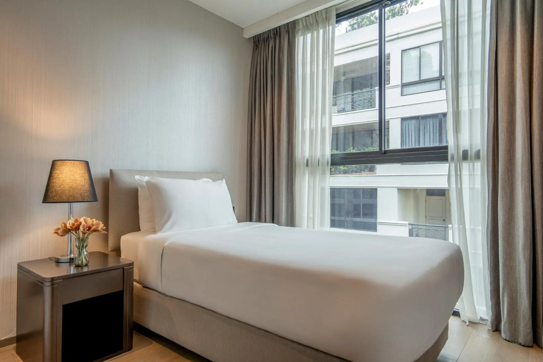 Bed in Walton Suites Sukhumvit