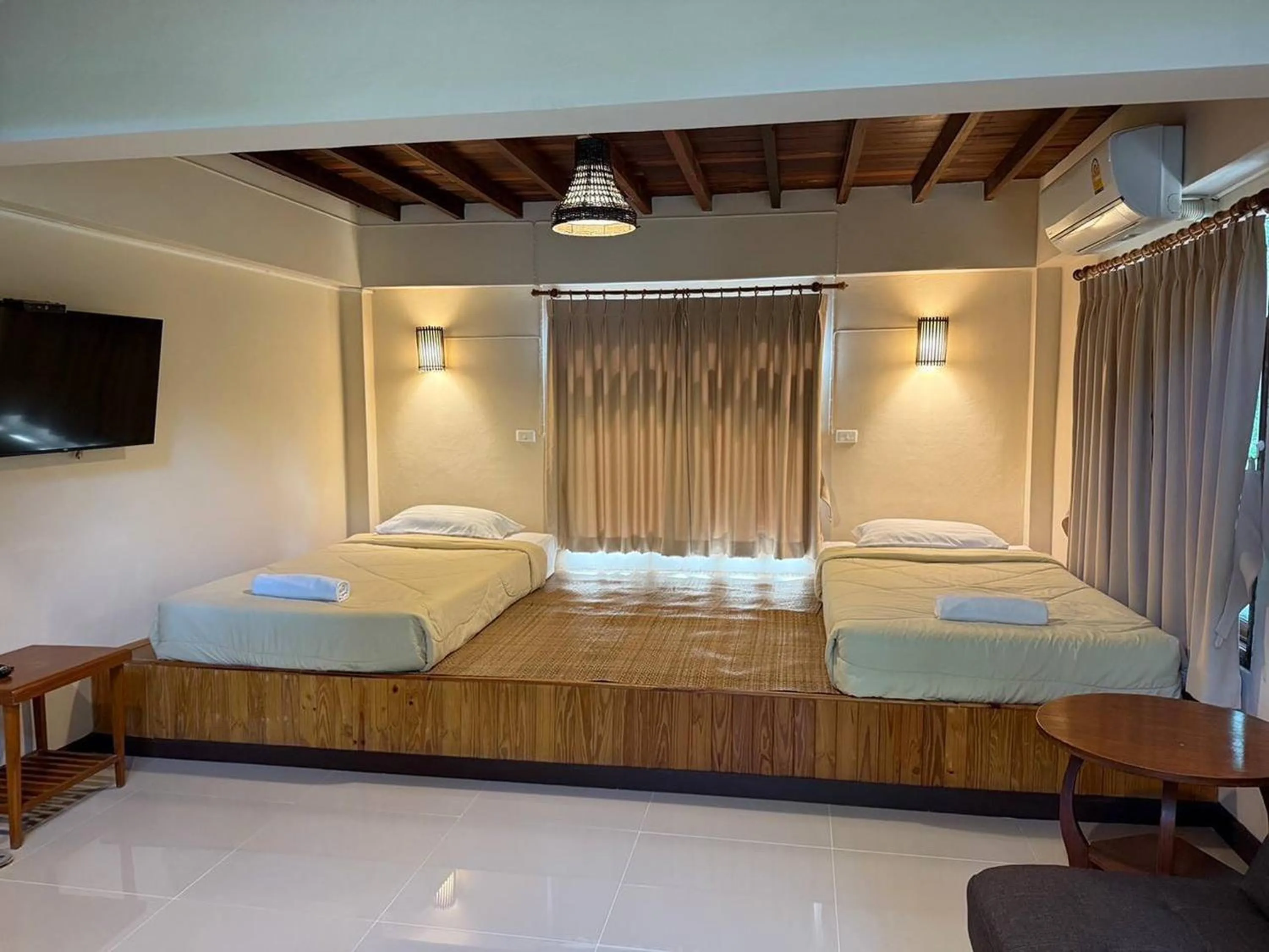 Bed in Bhupimarn Garden House