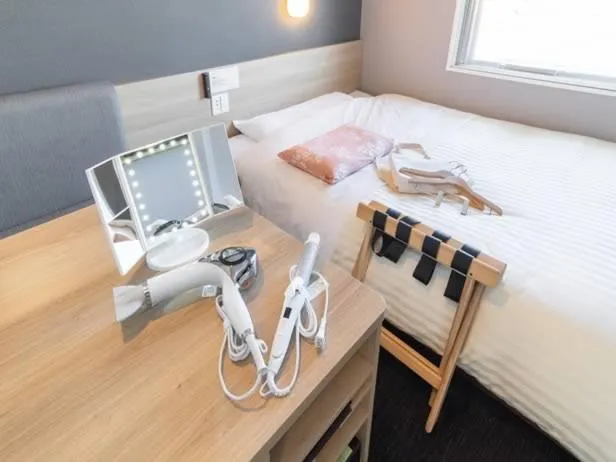 Bed in Super Hotel Mitazono Sendai Airport