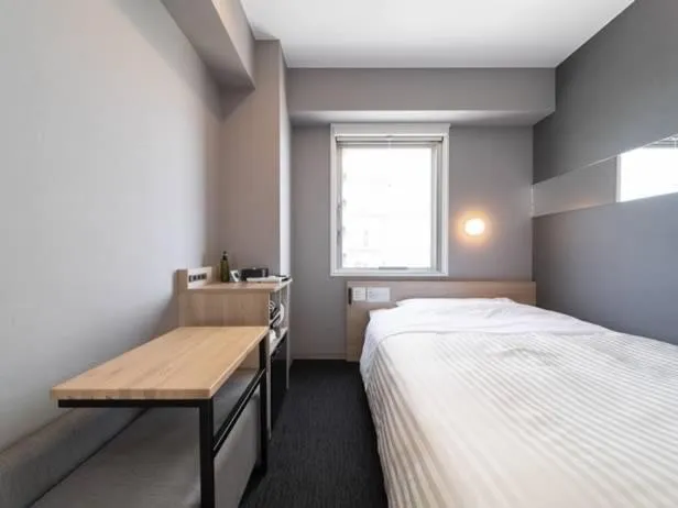 Bed in Super Hotel Mitazono Sendai Airport