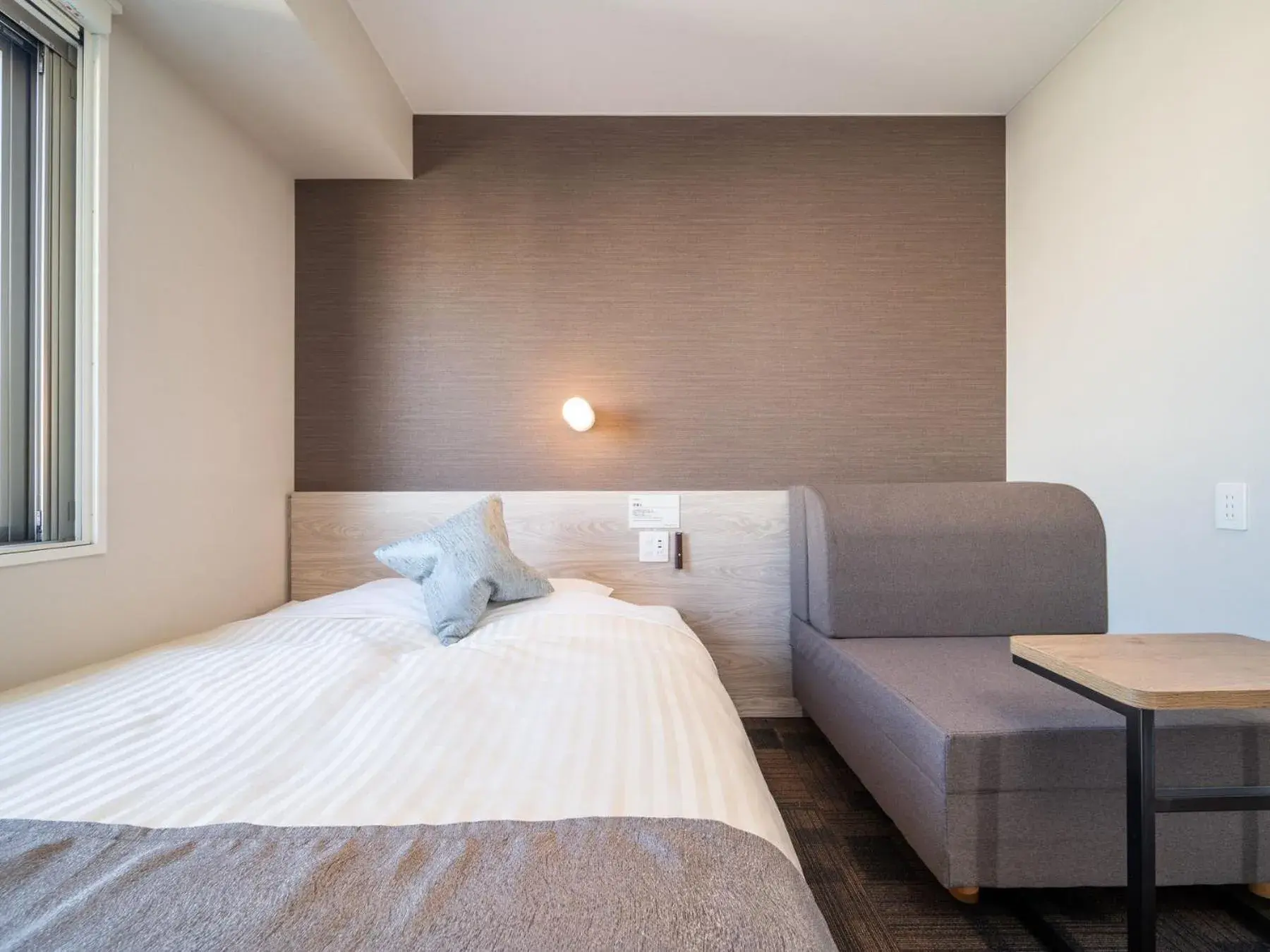 Bed in Super Hotel Mitazono Sendai Airport Bed in Super Hotel Mitazono Sendai Airport