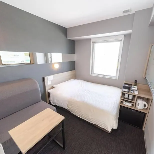 Bed in Super Hotel Mitazono Sendai Airport