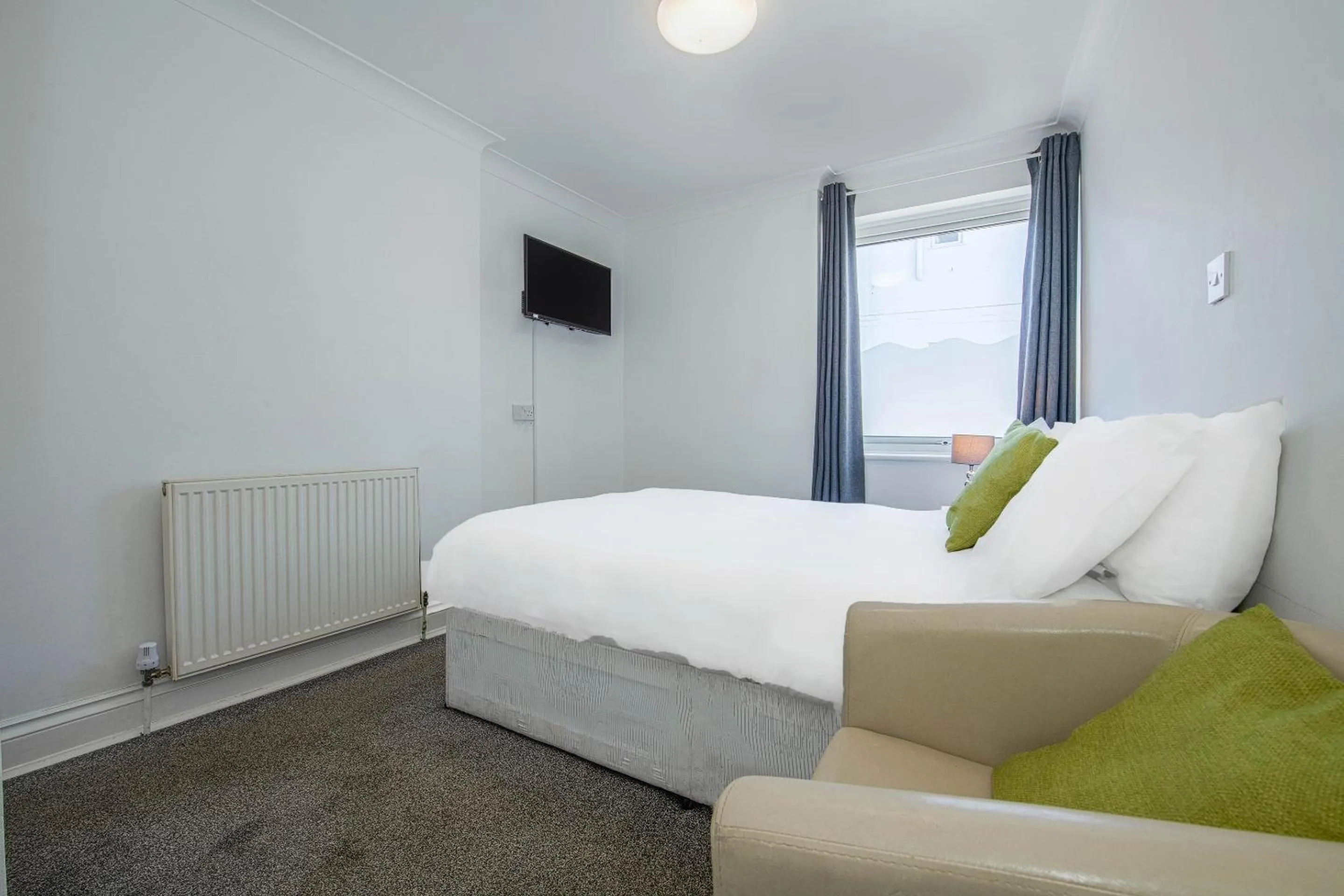 Bedroom, Bed in OYO Pier Hotel
