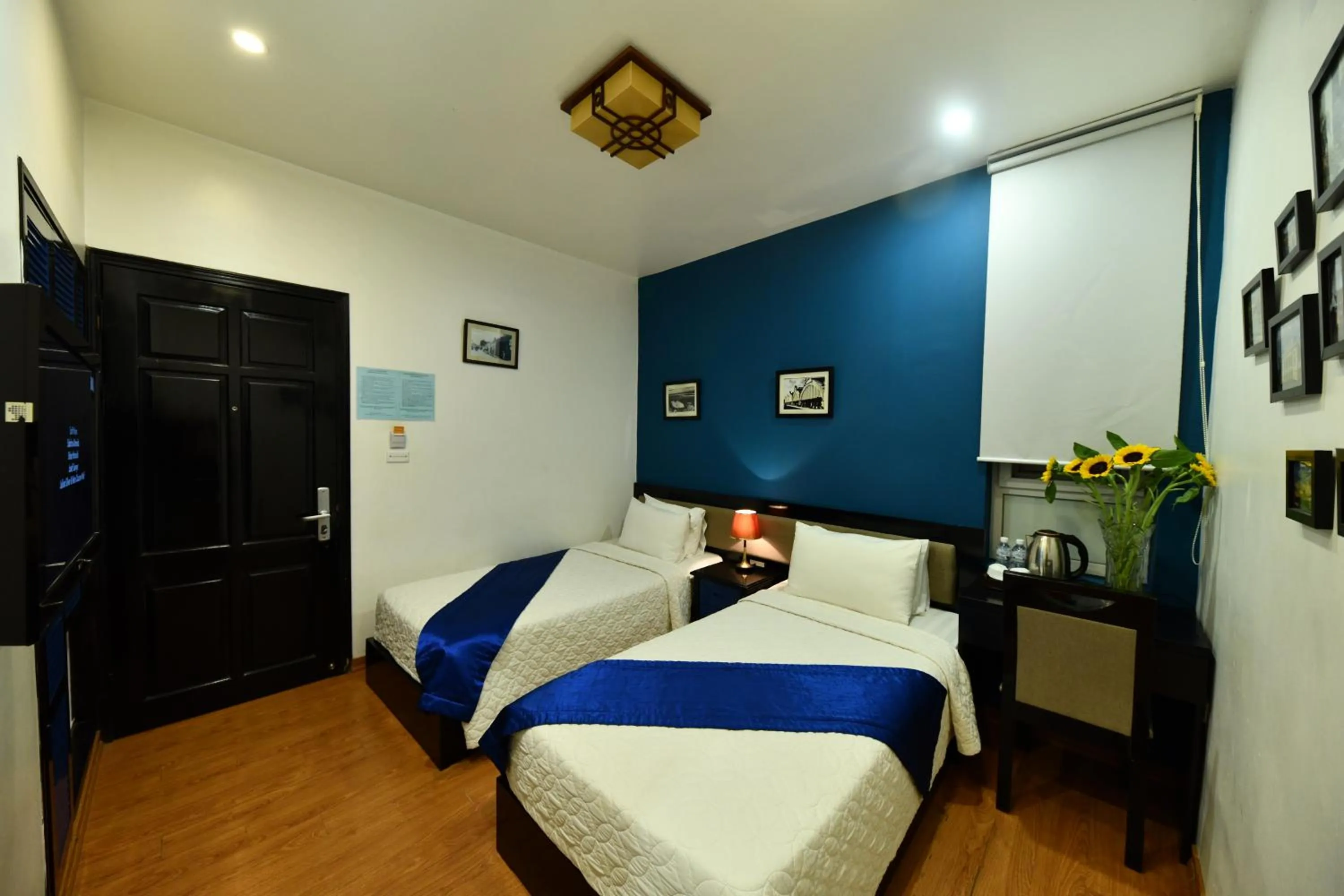 Photo of the whole room, Bed in Hanoi Starlight Boutique Hotel