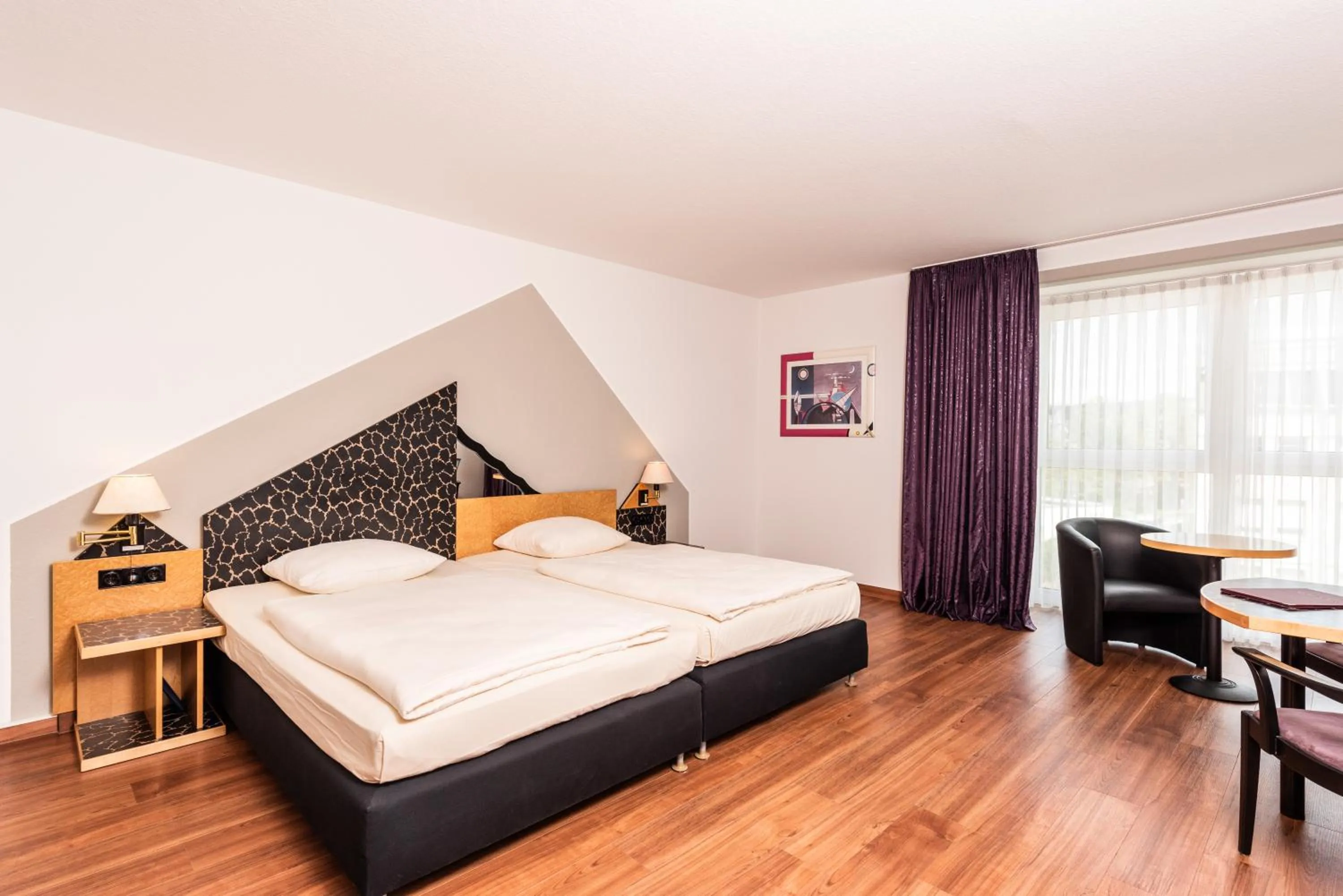 Bed in ARVENA Kongress Hotel - Hotel in der Wagnerstadt