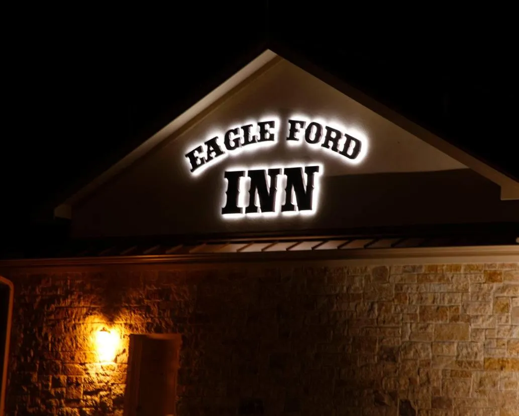 Property logo or sign in Eagle Ford Inn