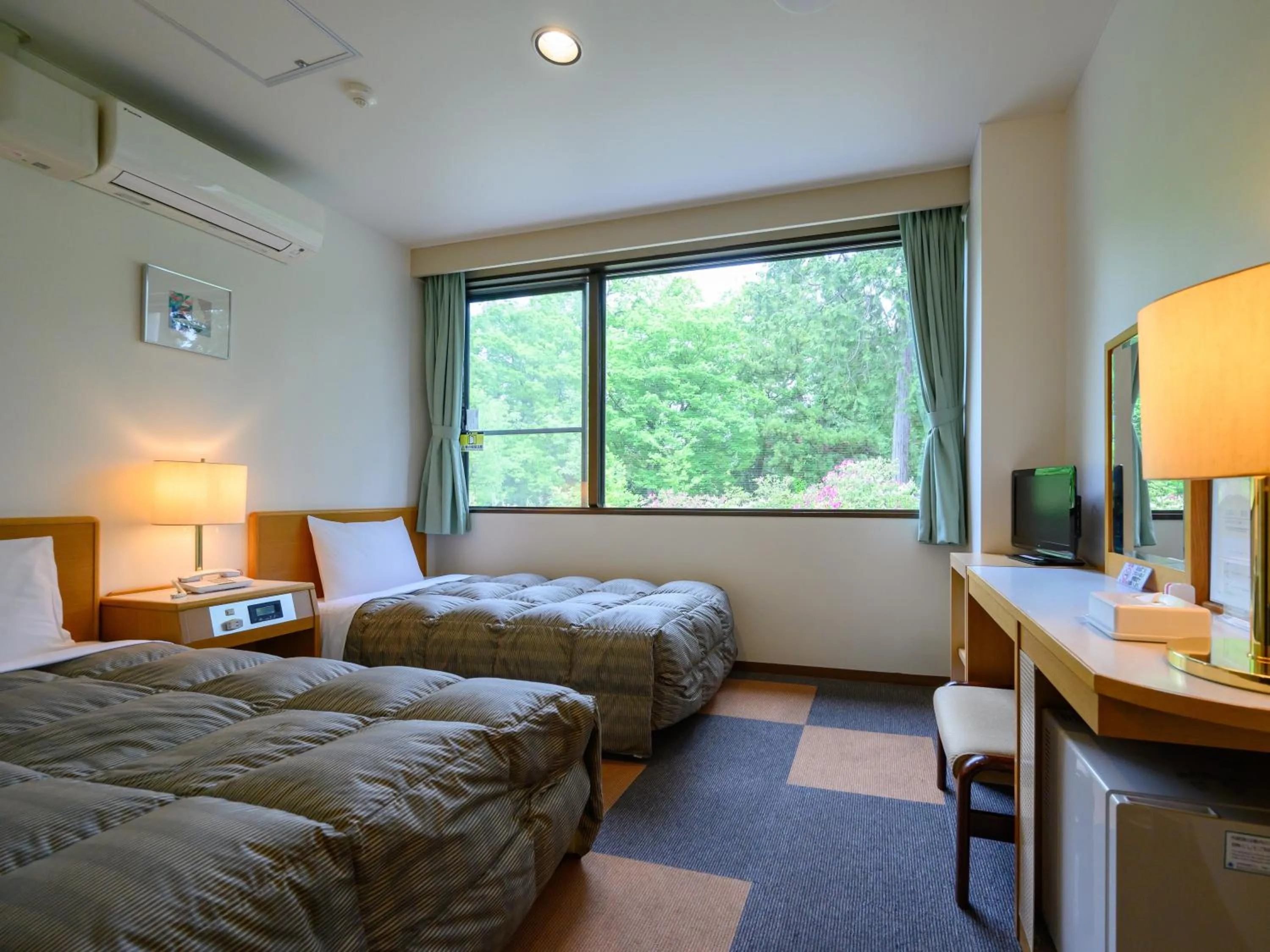 Photo of the whole room, Bed in Rest Inn Taga