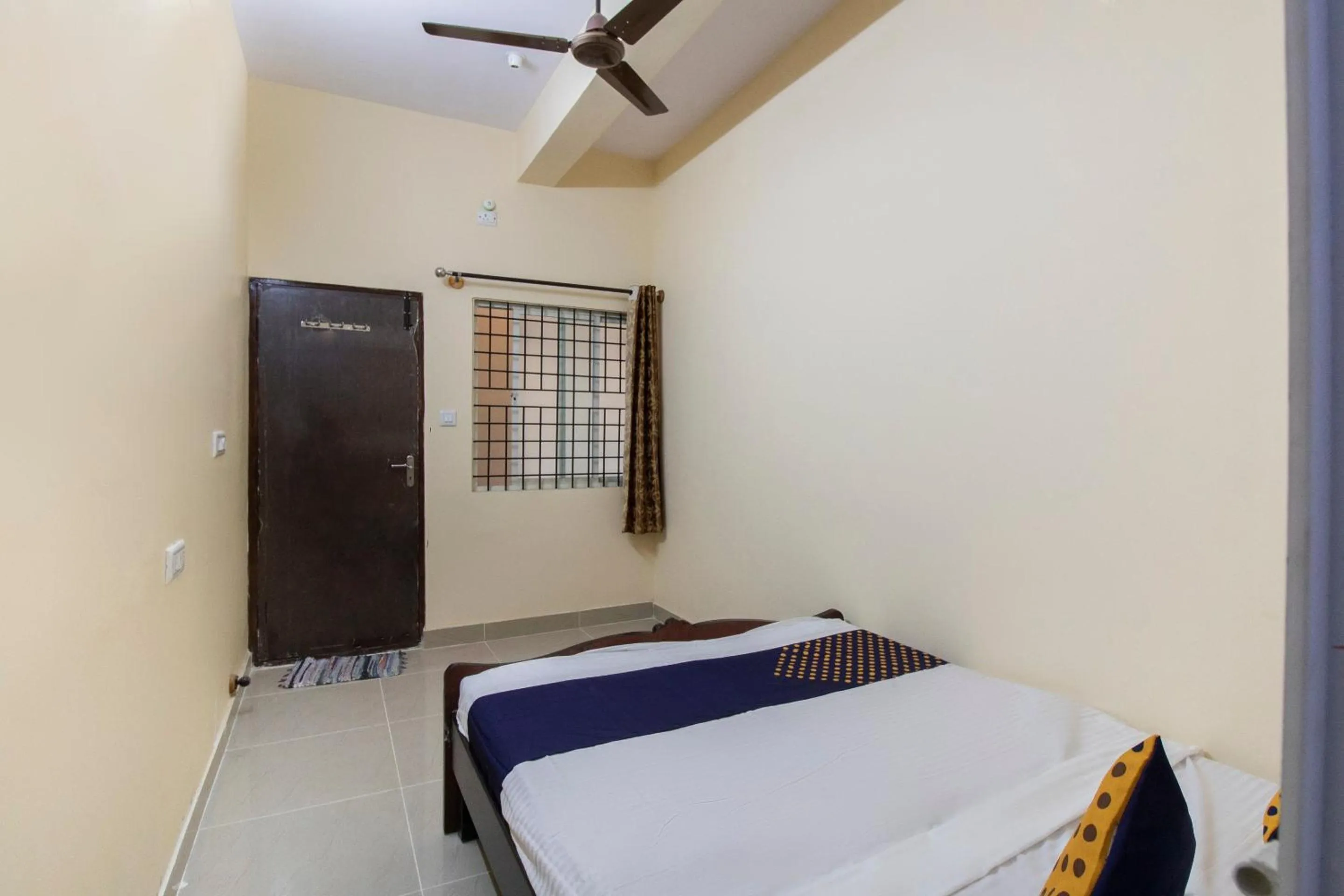 Bedroom, Bed in Hotel O SSR Lodging And Boarding