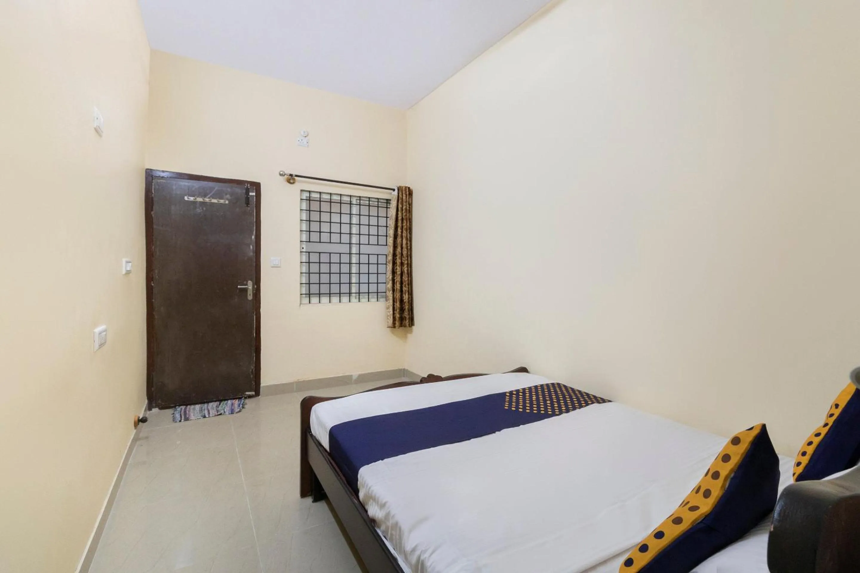 Bedroom, Bed in Hotel O SSR Lodging And Boarding