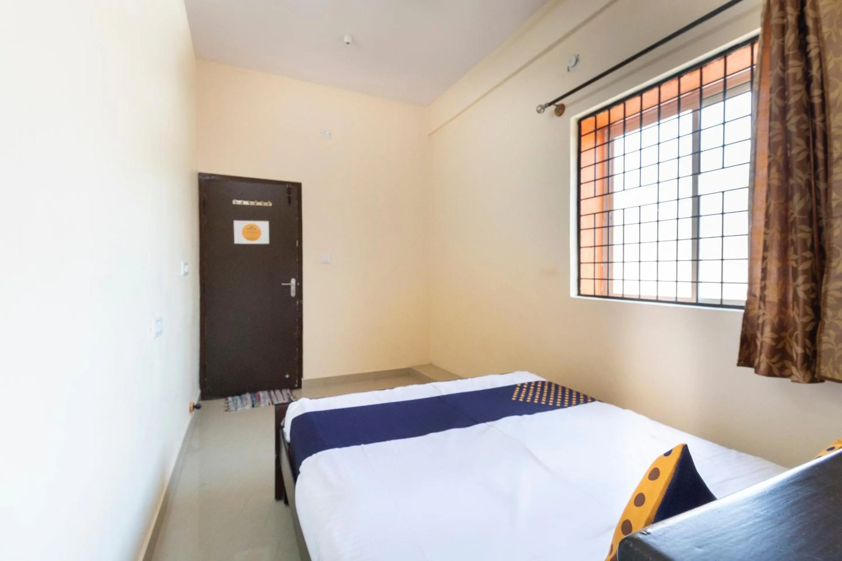 Bedroom in Hotel O SSR Lodging And Boarding