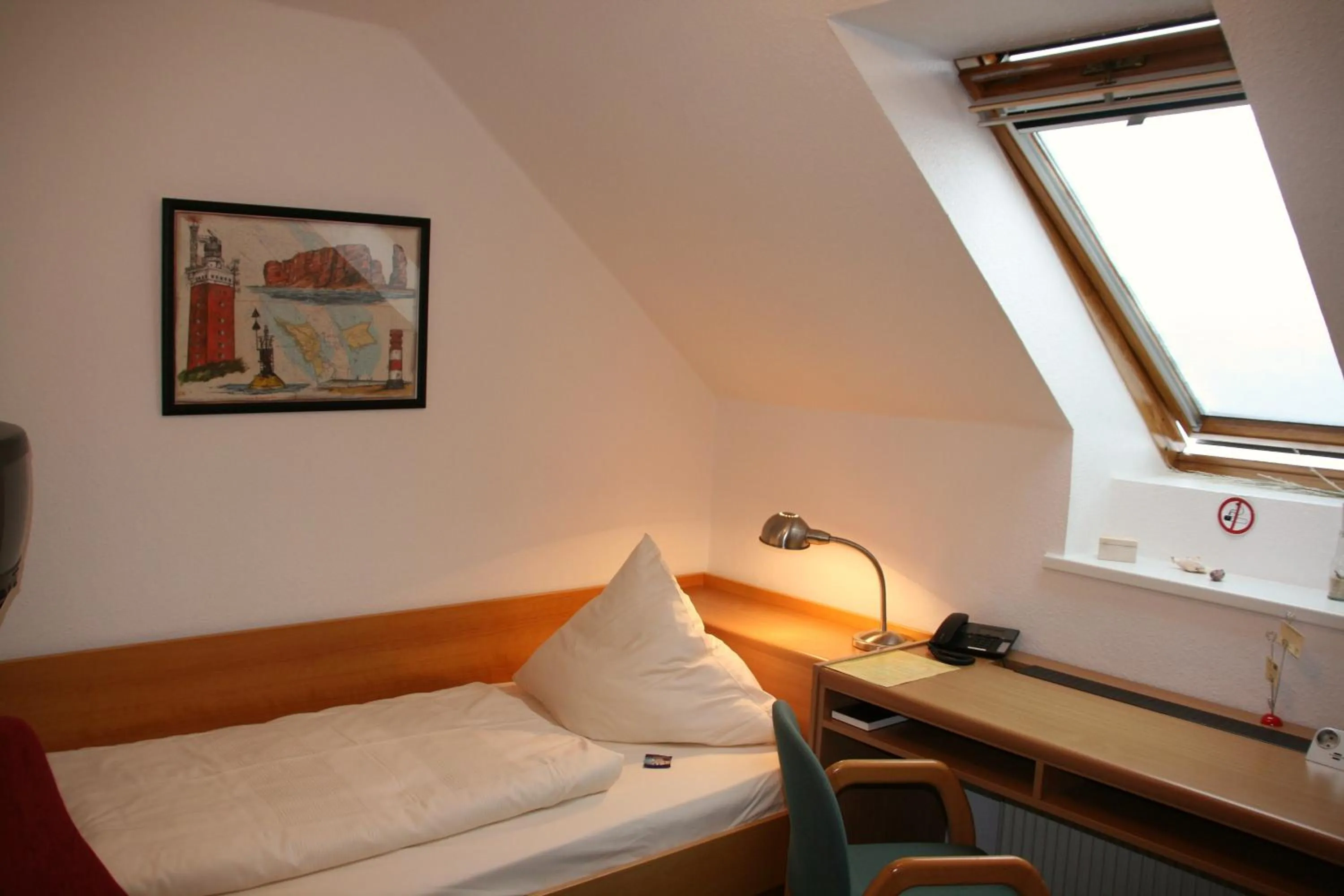 Bed in Gästehaus Schlossgarten