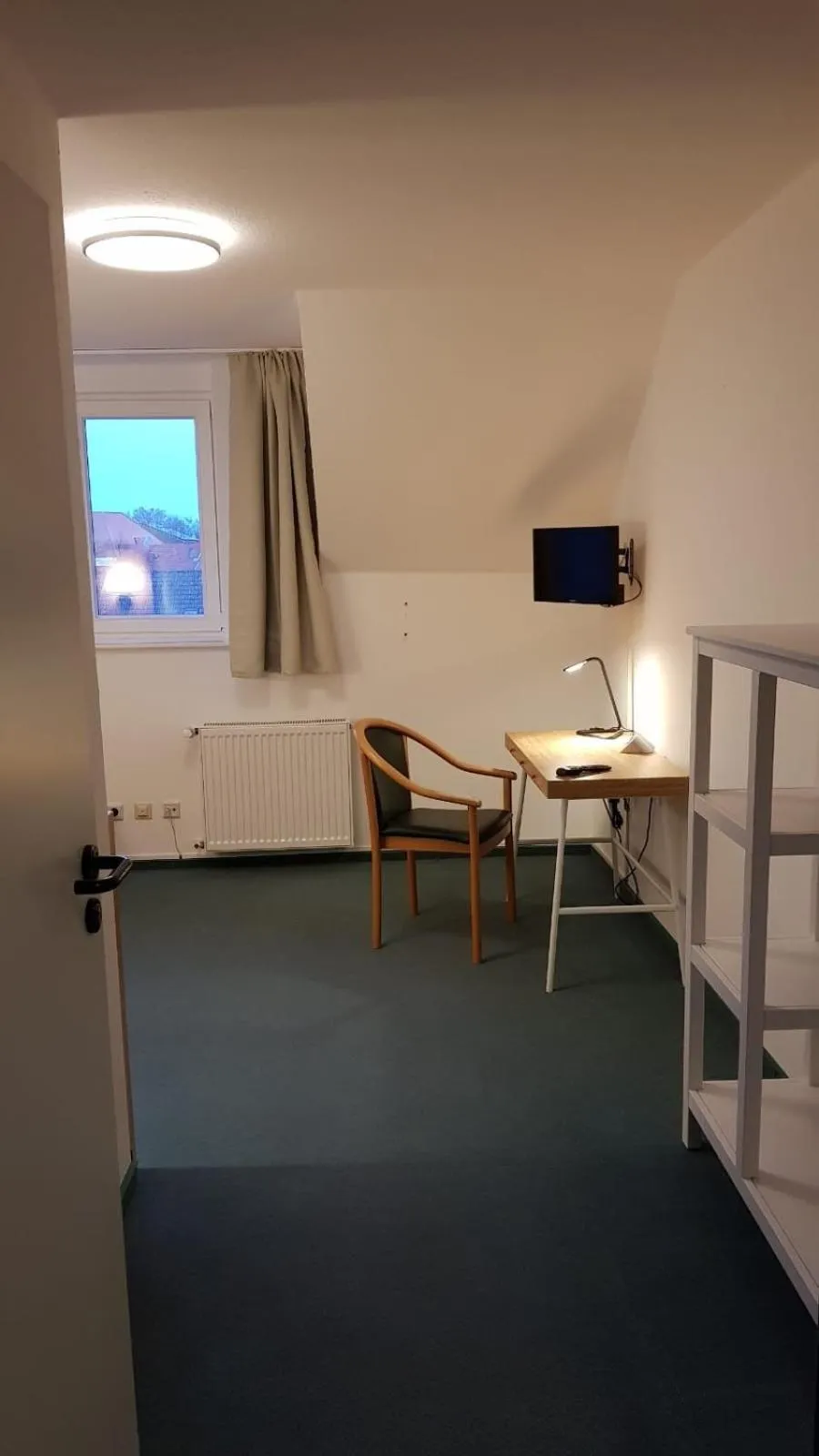 Photo of the whole room, Bed in Gästehaus Schlossgarten